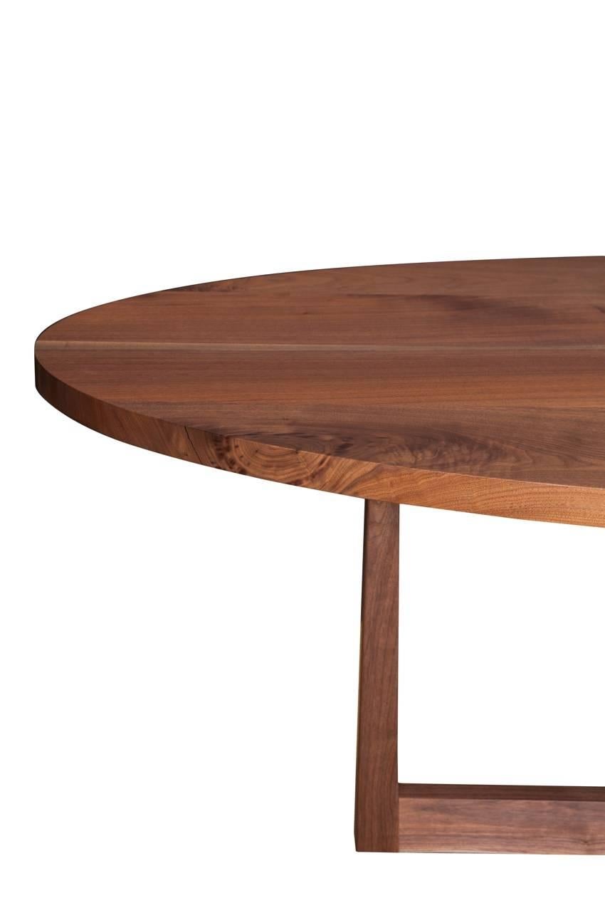 Solid American black walnut dining table oil and wax finish with copper detailing by Paul Mignogna for Stillmade.

Custom orders have a lead time of 10-12 weeks FOB NYC. Lead time contingent upon selection of finishes, approval of shop drawings