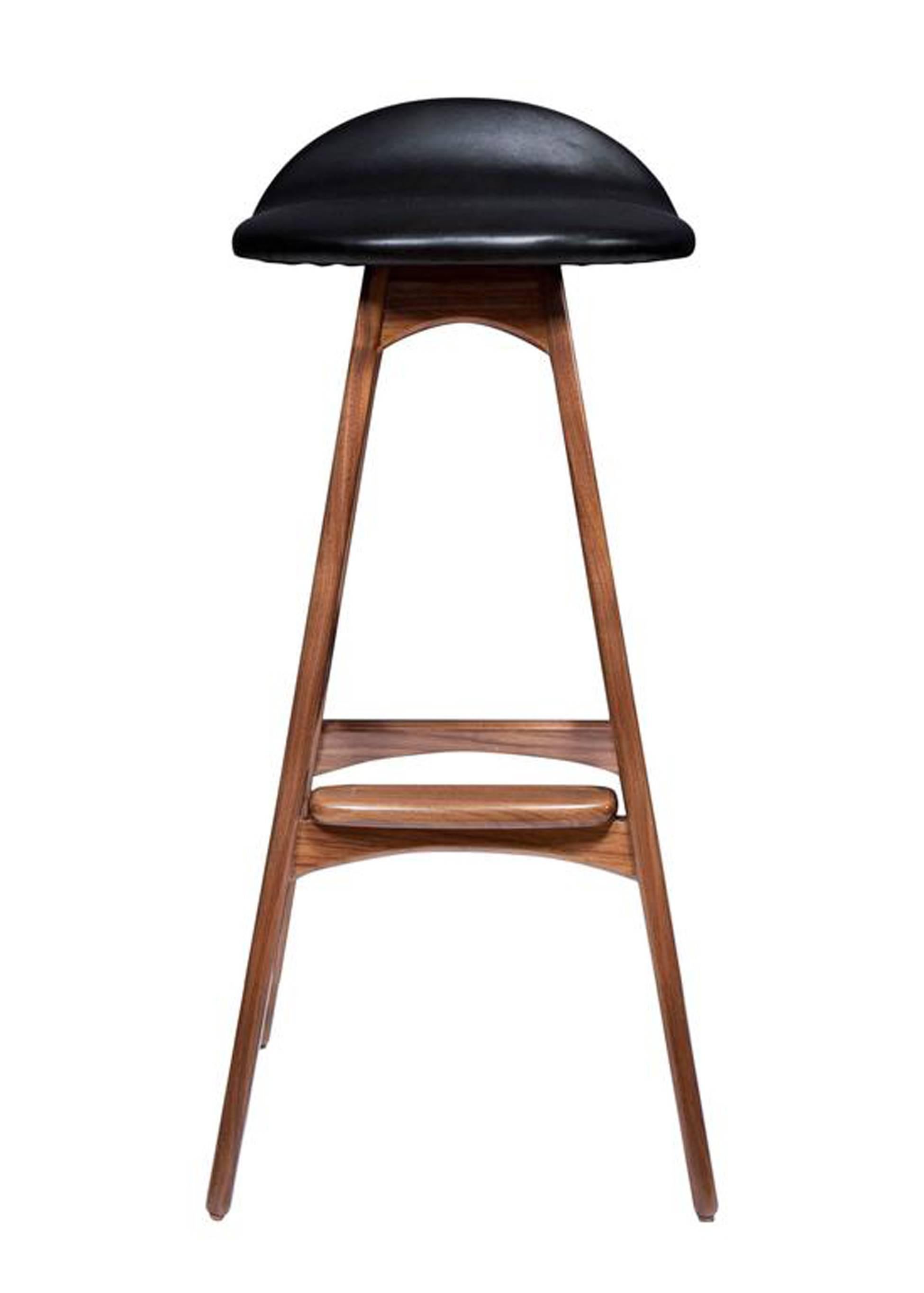 Boyd stool shown in solid walnut with black leather seat.
Measure: Seat height 29.75”
Custom orders have a lead time of 10-12 weeks FOB NYC. Lead time contingent upon selection of finishes, approval of shop drawings (if applicable), and receipt
