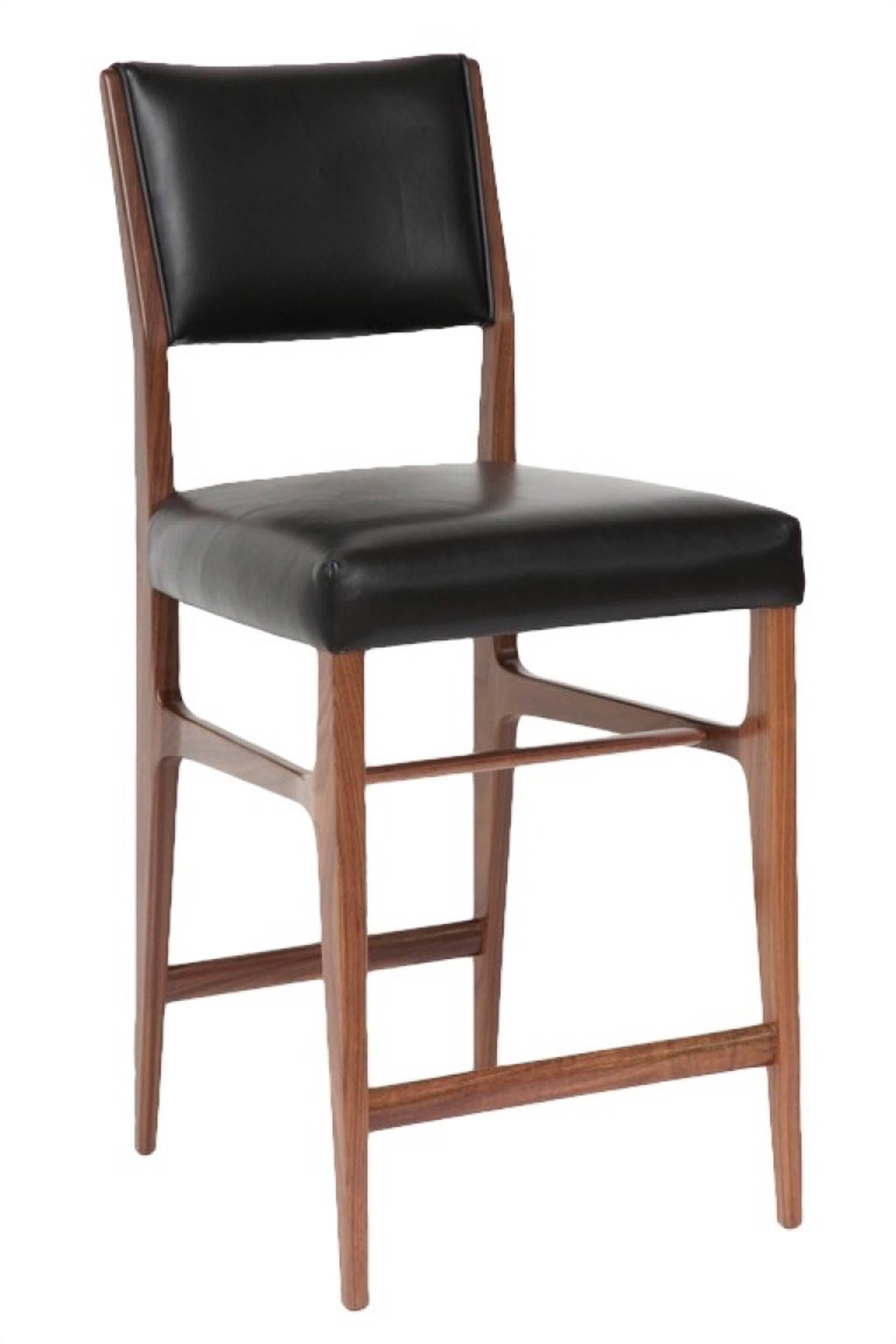 Maze walnut counter stool.
Measures: Seat height-25”
Custom orders have a lead time of 8-10 weeks FOB NYC. Lead time contingent upon selection of finishes, approval of shop drawings (if applicable), and receipt of 1.5 yards COM / 30 sq. feet COL