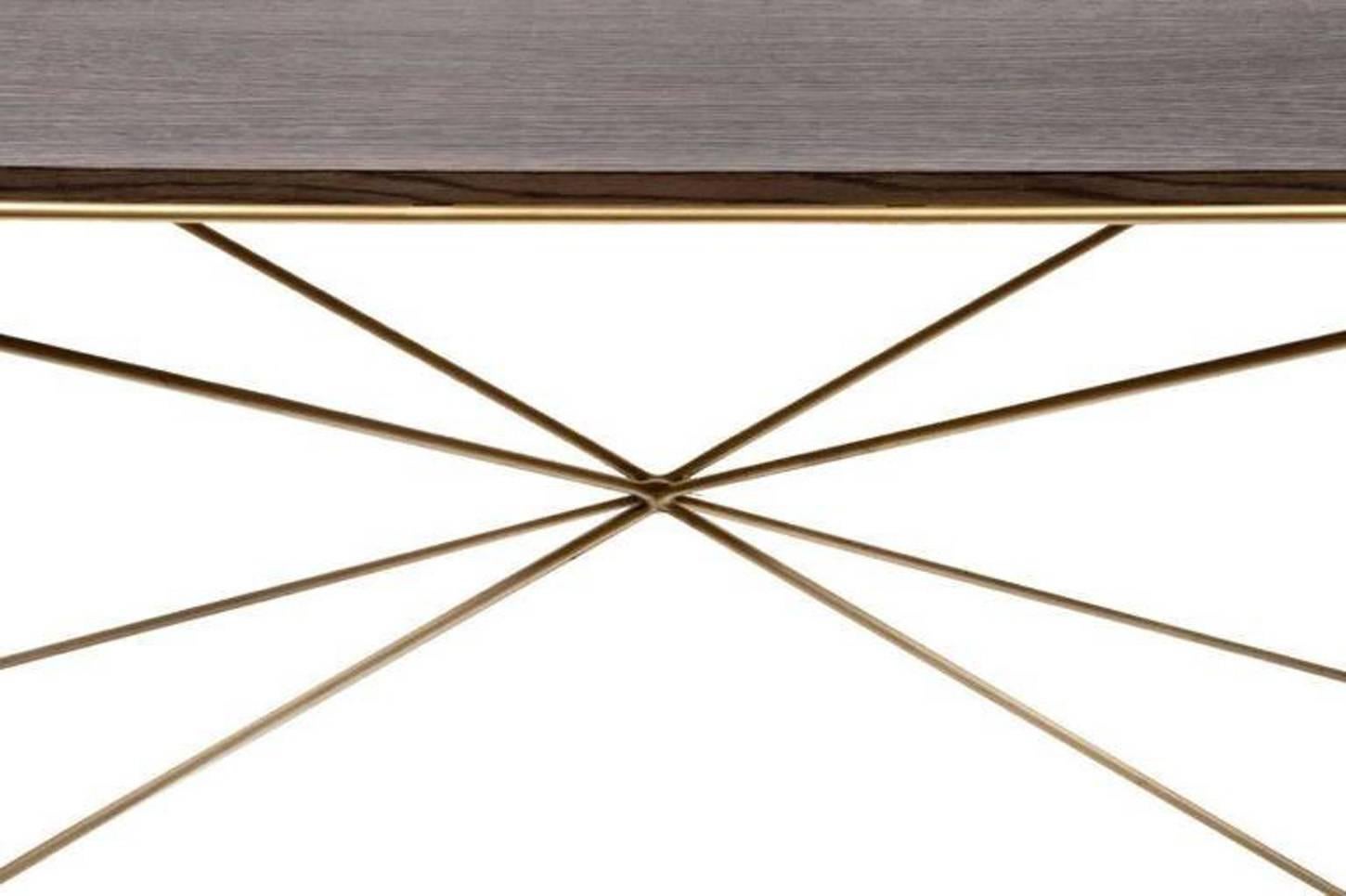 Robert console table with greyed oak top and satin brass base. 

Custom orders have a lead time of 10-12 weeks FOB NYC. Lead time contingent upon selection of finishes, approval of shop drawings (if applicable) and receipt COM (if applicable.)