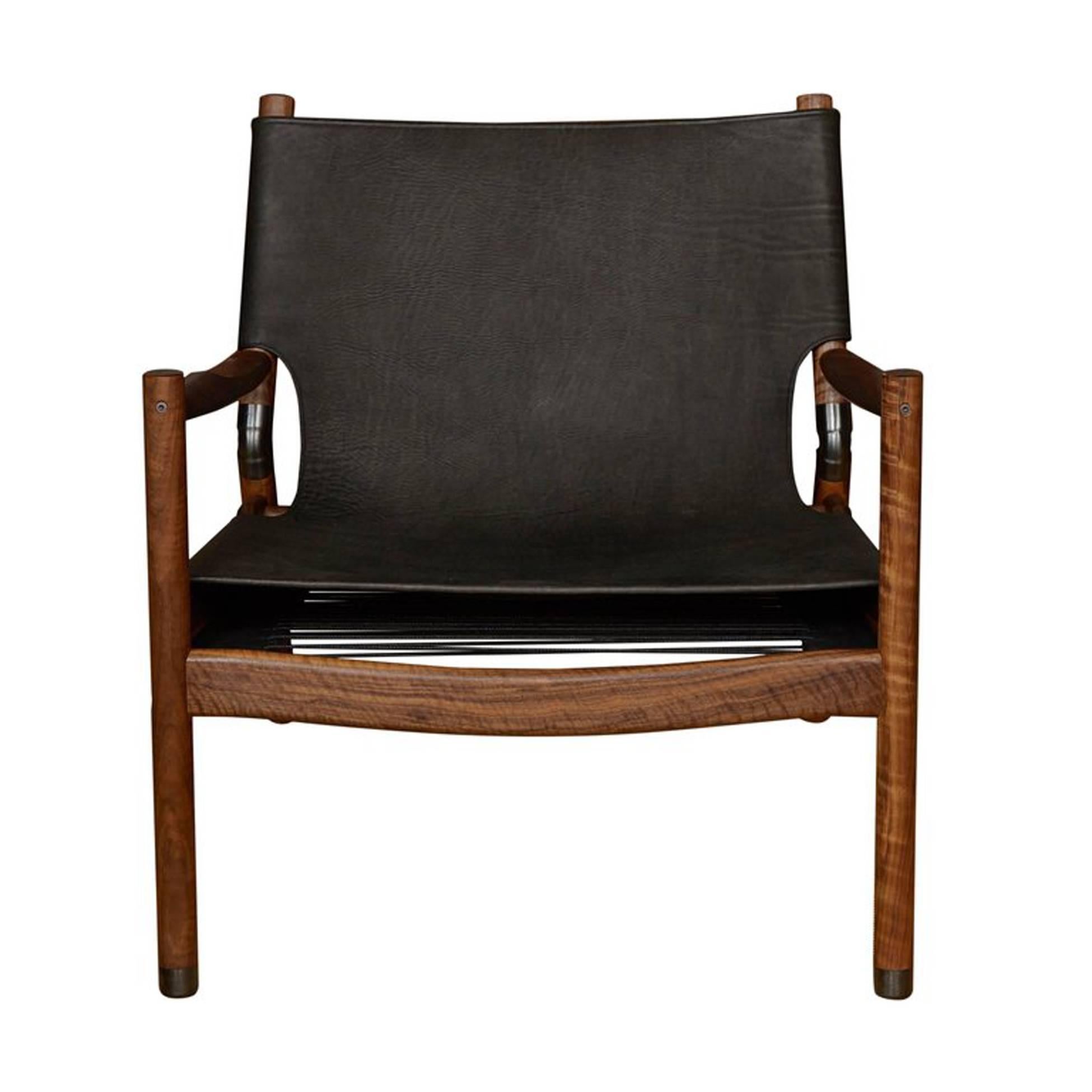 Matte black buffalo leather walnut lounge chair with blackened brass sabots and joint connectors.
Designed by Ben Erickson for Erickson Aesthetics.
Measure: Seat height 15”
Seat depth 23”
Custom orders have a lead time of 10-12 weeks FOB NYC.