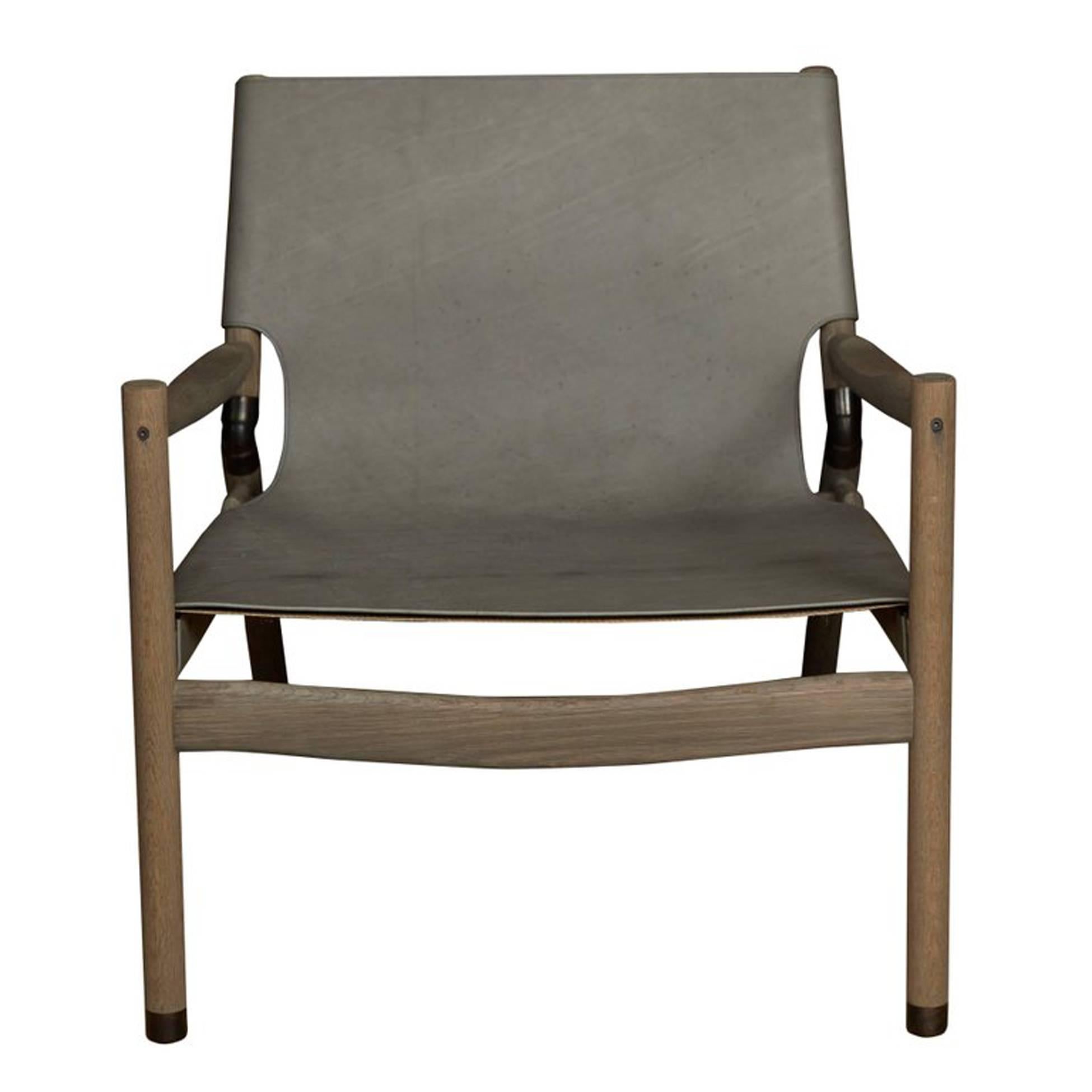 Erickson Aesthetics slung leather greyed oak lounge chair.
Measure: Seat height 15”
Custom orders have a lead time of 10-12 weeks FOB NYC. Lead time contingent upon selection of finishes, approval of shop drawings (if applicable), and receipt COM