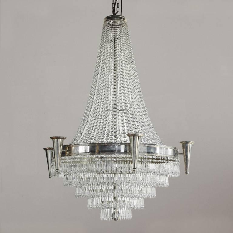 A glass and nickel-plated Art Deco chandelier, circa 1930.