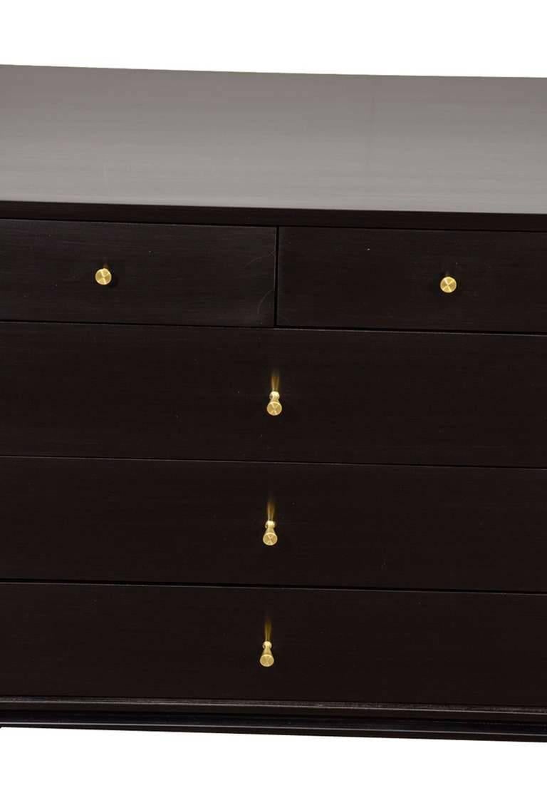 Paul McCobb 20-drawer dresser, circa 1955 in pristinely restored condition. Dresser features ten exterior drawers with ten interior small drawers behind left and right side doors. Solid maple construction throughout restored in a piano black lacquer