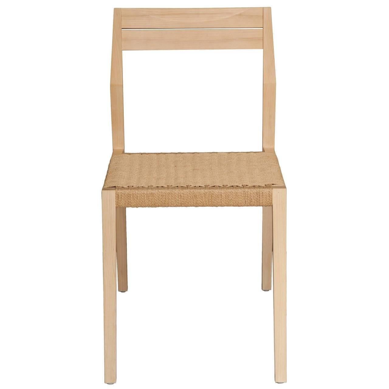 Set of ten oiled ash dining chair with paper cord seat. 
Designed by Paul Mignogna for Stillmade.

Measures: Seat height 18.5”.
Seat depth 18”.

Custom orders have a lead time of 10-12 weeks FOB NYC. Lead time contingent upon selection of