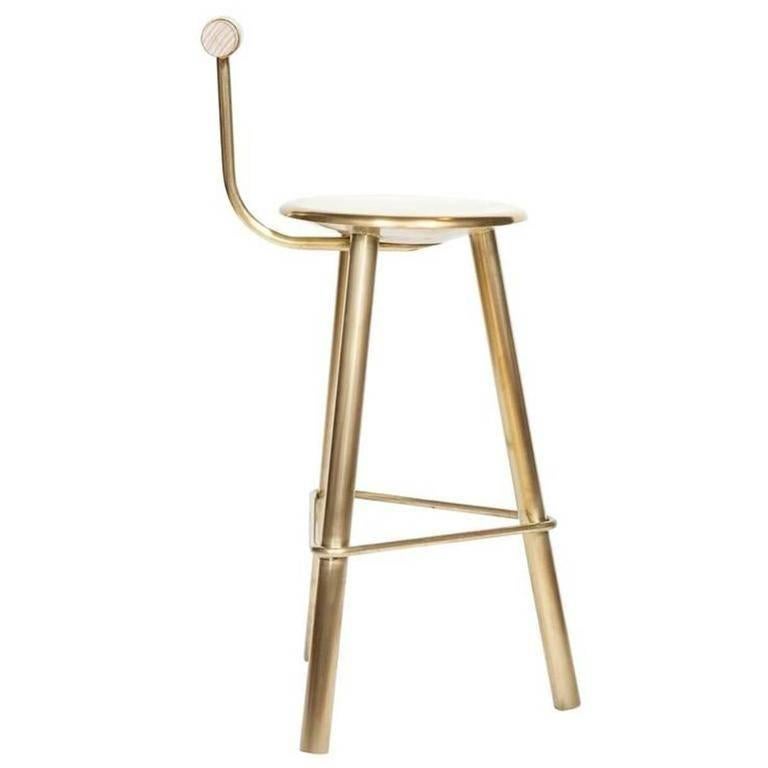 Erickson aesthetics hand polished brass tripod stool with oak backrest by Ben Erickson.

Seat height 27”

Custom orders have a lead time of 10-12 weeks FOB NYC. Lead time contingent upon selection of finishes, approval of shop drawings (if