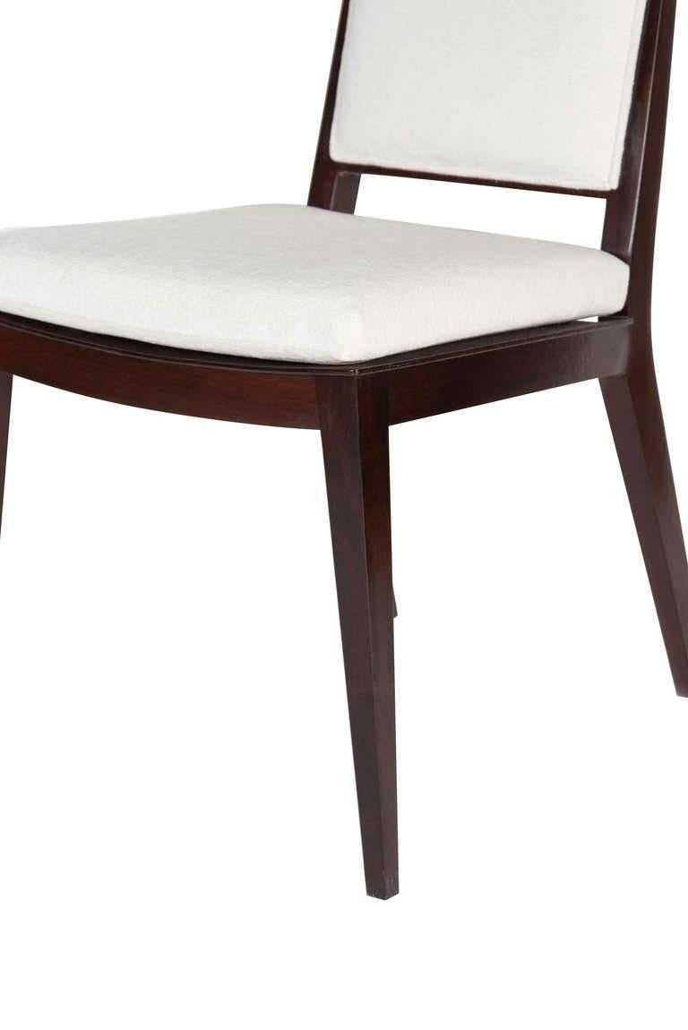 Solid Mahogany frame back dining chair. 

Seat height-19”. 
Seat depth -17.5”. 

COM requirements: 2 yards.
5% up-charge for contrasting fabrics and or welting.
COL requirements:40 sq. feet.
5% percentage up-charge for all COL or exotic