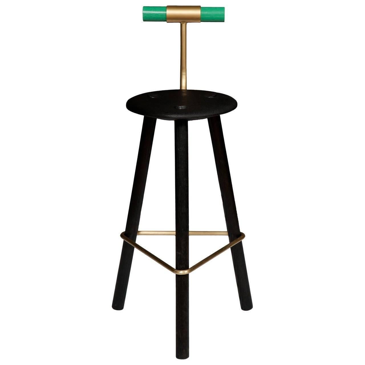 Charred ash tripod stool with lacquered ash backrest and satin brass supports.
Designed by Ben Erickson for Erickson Aesthetics.

Custom orders have a lead time of 10-12 weeks FOB NYC. Lead time contingent upon selection of finishes, approval of
