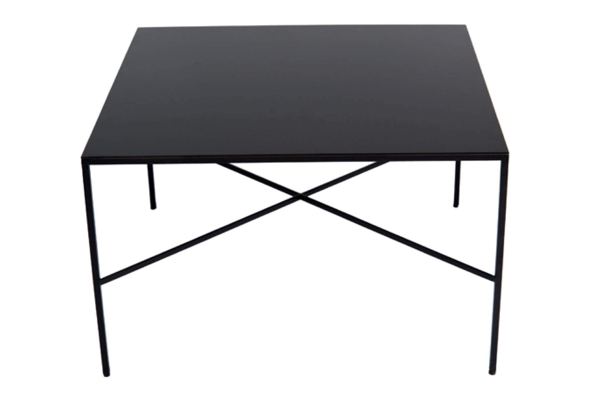 Steel frame X-stretcher table shown in a black oxide satin finish with blackened steel plate top.

Custom orders have a lead time of 10-12 weeks FOB NYC. Lead time contingent upon selection of finishes, approval of shop drawings (if applicable),