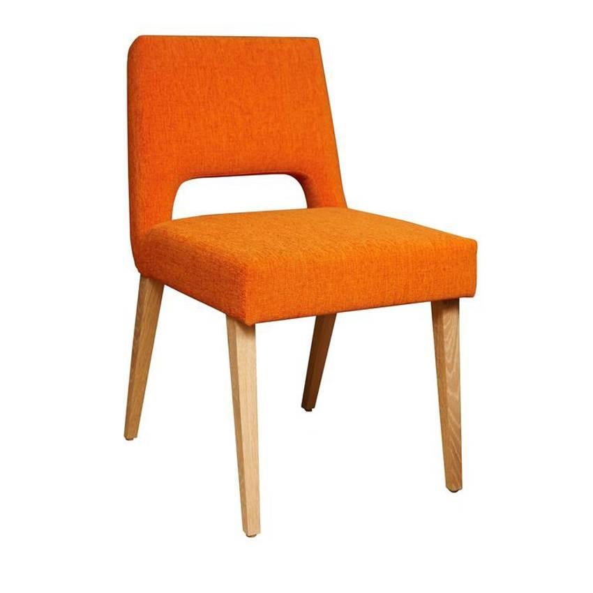 Solid oak square leg dining chairs with open upholstered back and fully upholstered tight seat.
Seat height 18"
COM requirements: 1.5 yards
5% up-charge for contrasting fabrics and or welting
COL requirements: 30 sq. feet
5% percentage