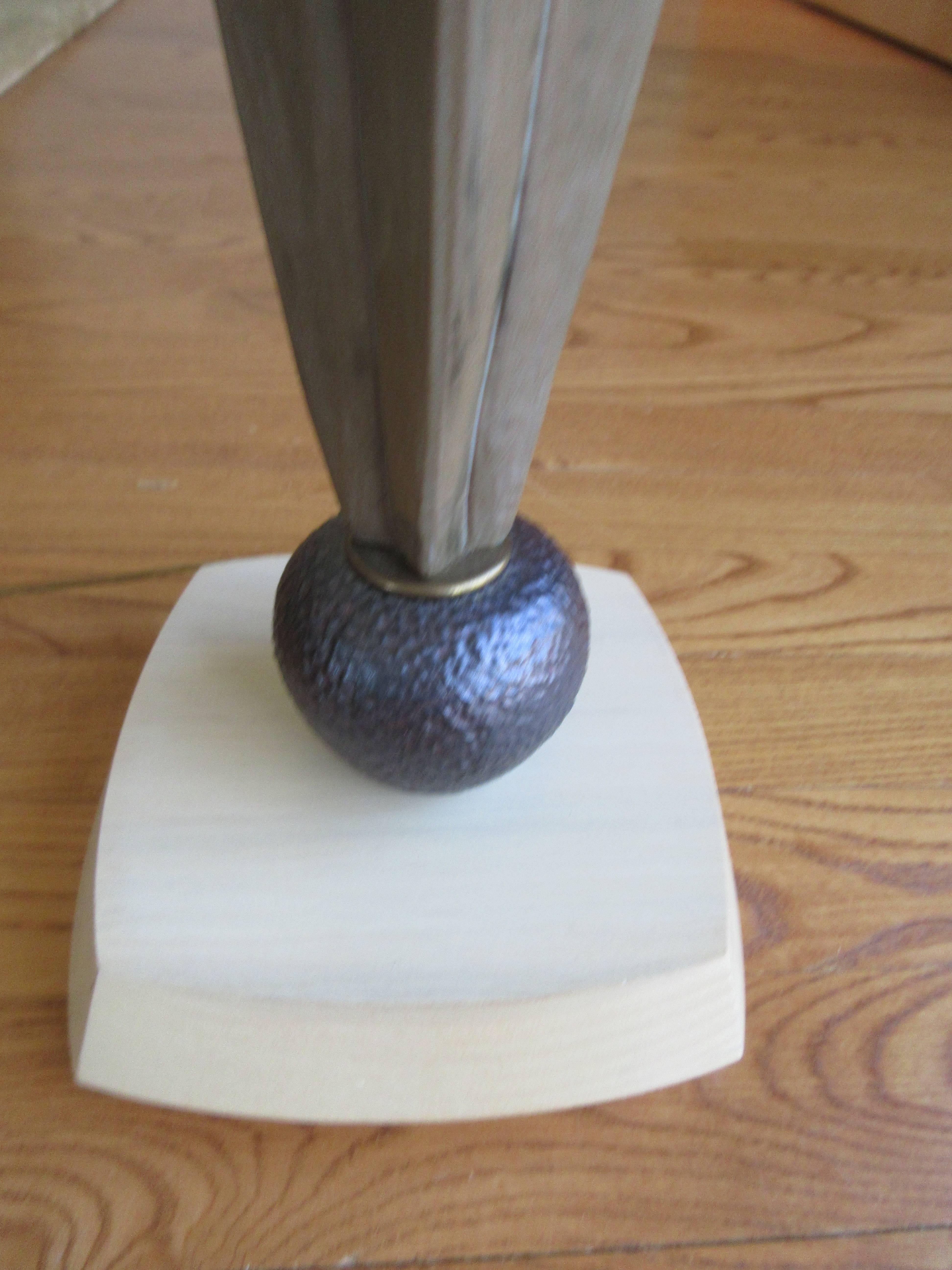 Pair of rare /custom Danish Mid-Century driftwood and hammered bronze table lamps. Wood base with an off-white wash, driftwood column (free-form) hammered bronze sphere at base and Celtic style bronze final.
Measures: 36 high to finial and 23