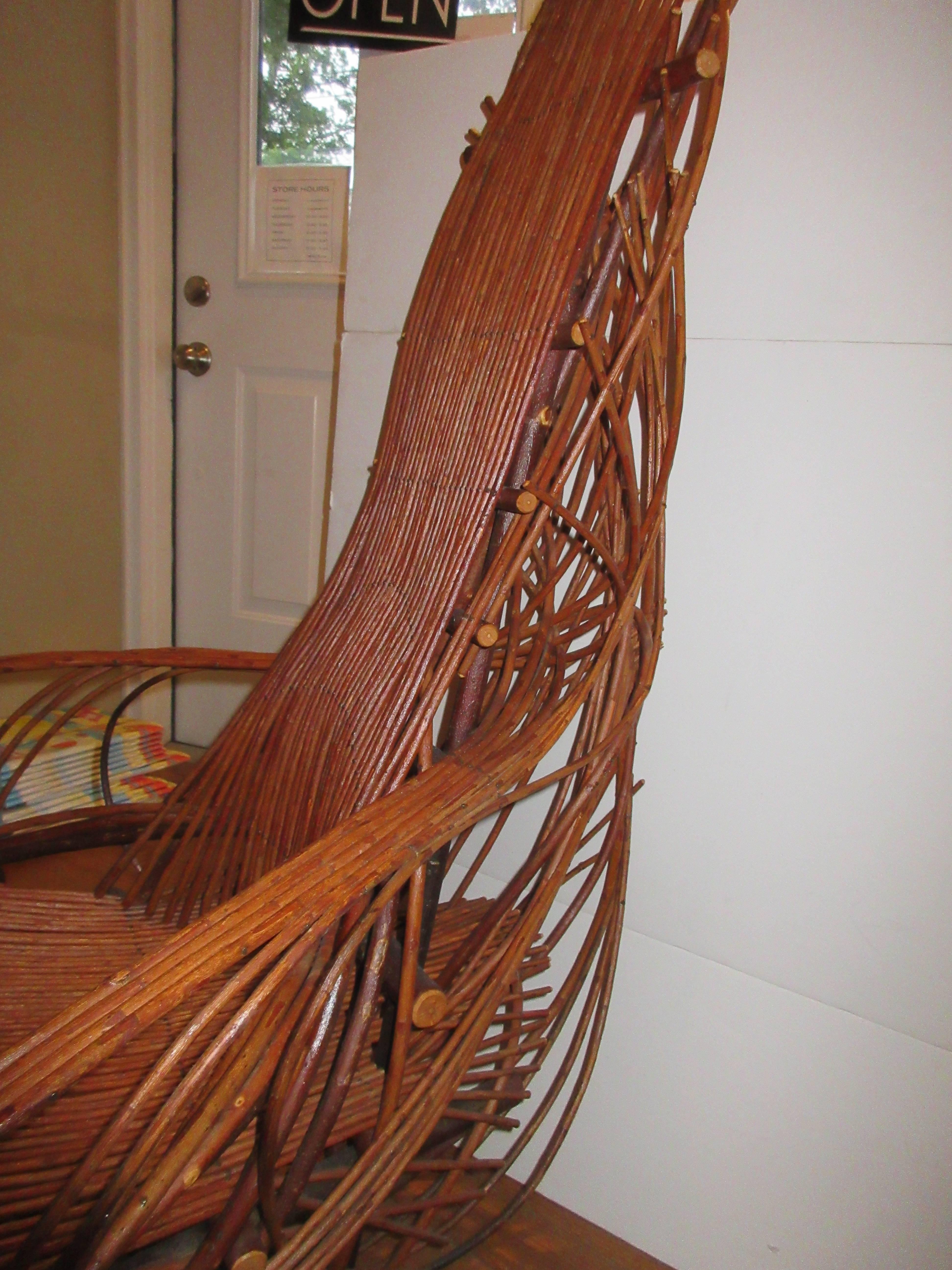A Clfton Monteith twisted willow armchair, perfectly handcrafted with the most impeccable details.