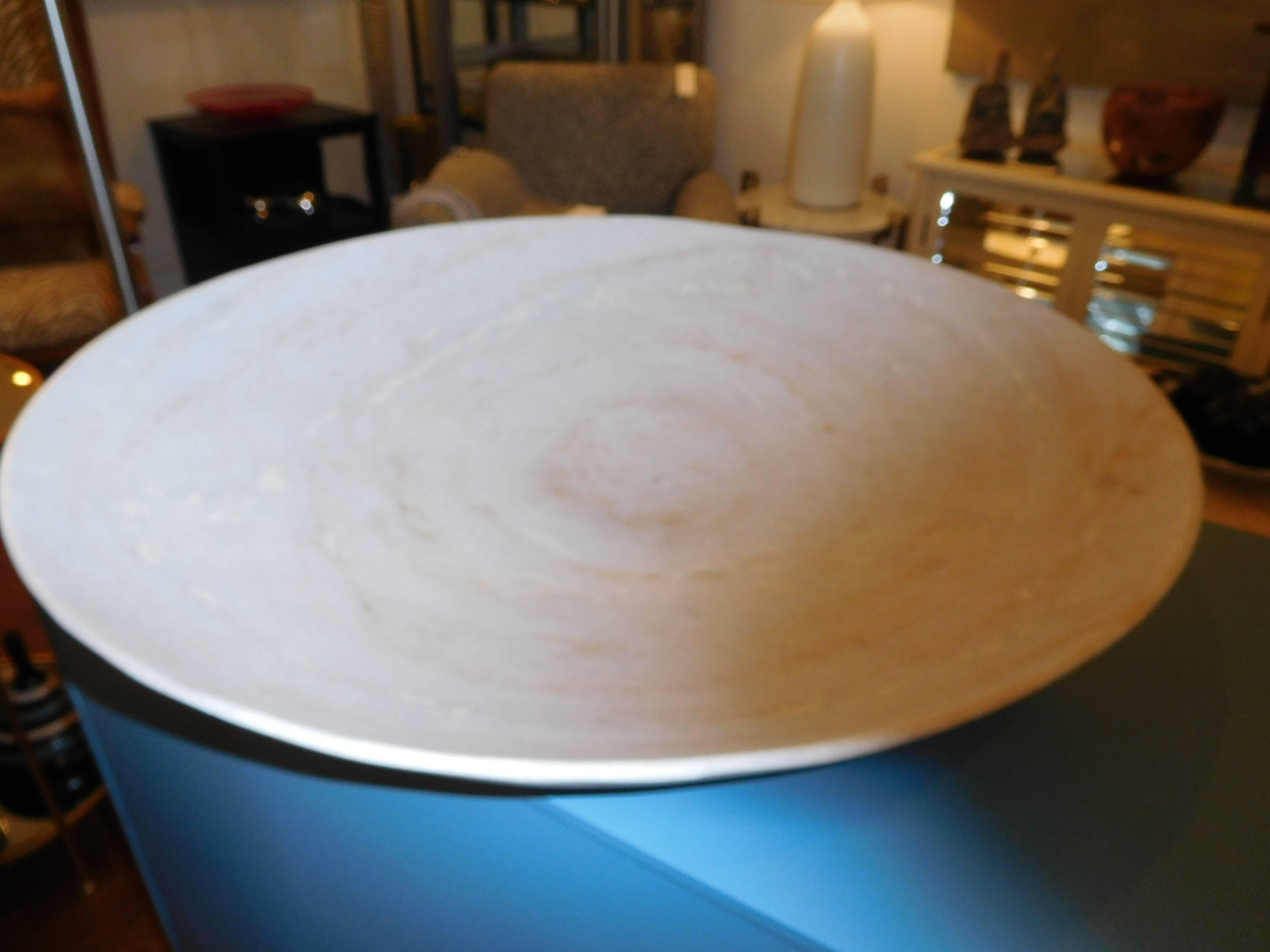 A large studio crafted white alabaster bowl.