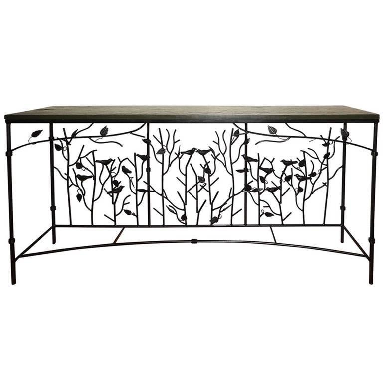 A rare console table in the style of Diego Giacometti, hand-forged birds and leaves, beautifully perched on winding sculptural branches.
Glass top (1/2 thick.)
   