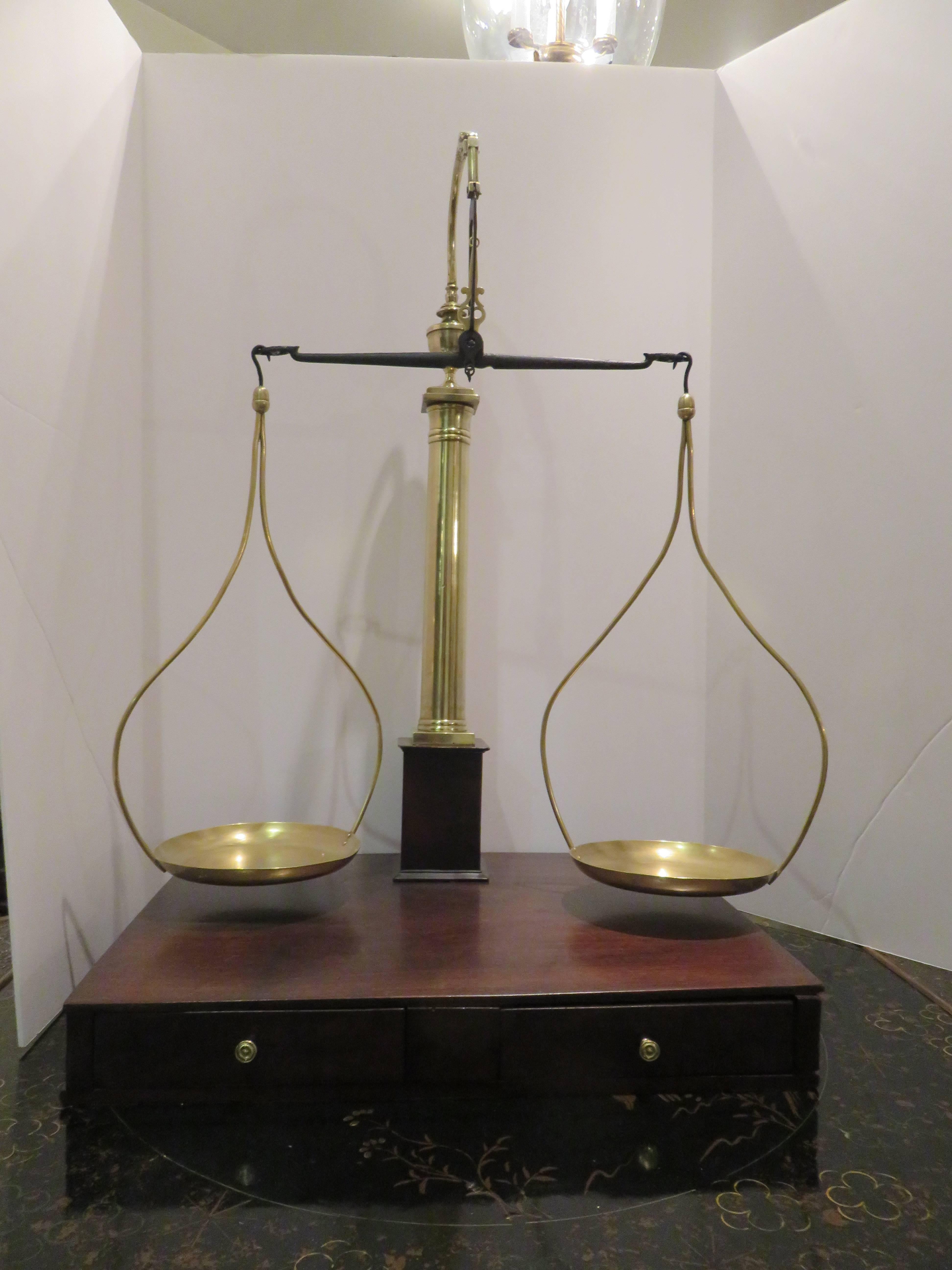 A French goose neck brass and mahogany apothecary scale. Two drawers with brass pulls, solid mahogany woods, lovely restored condition.