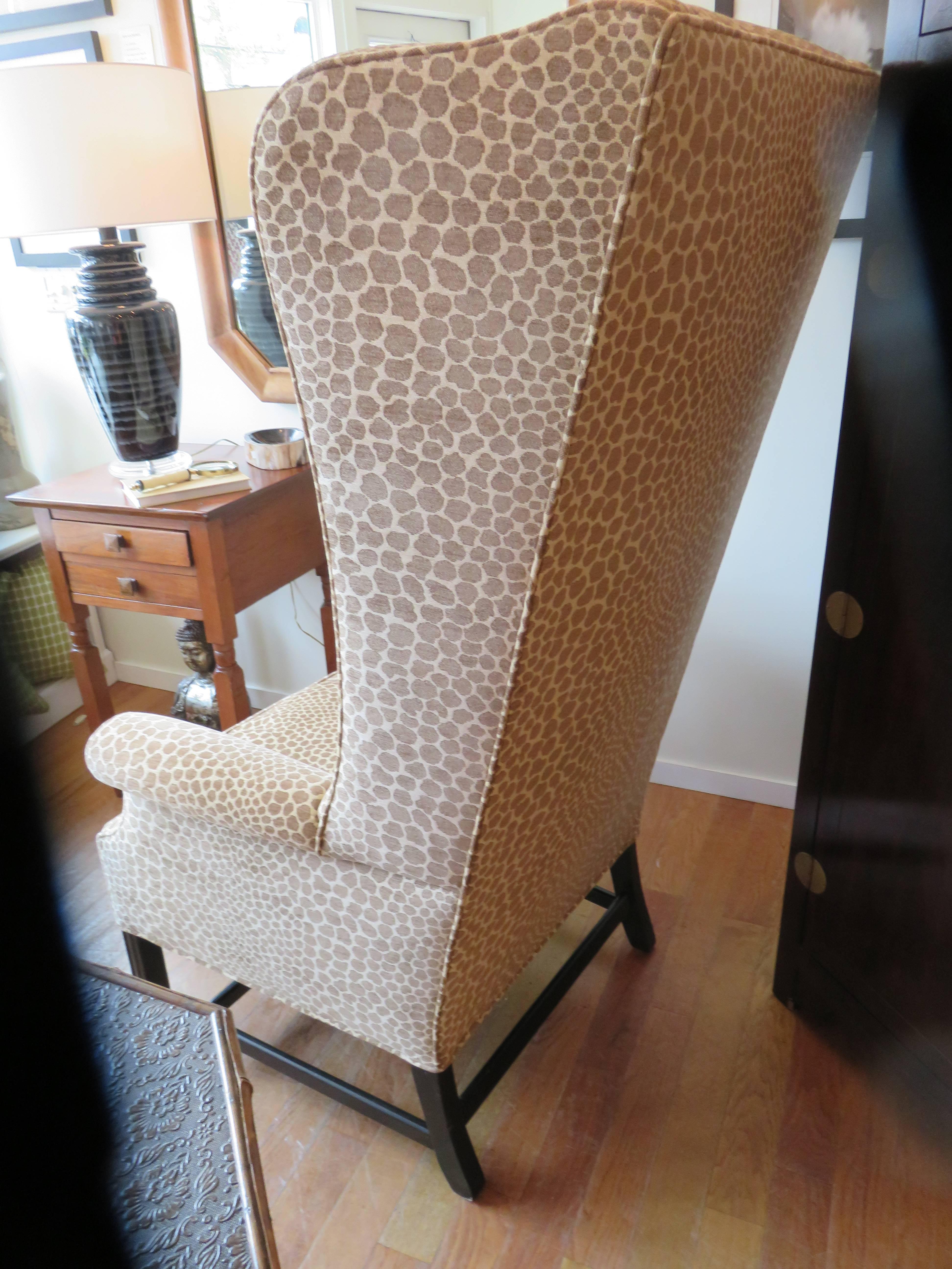 This chair is one of a kind, custom made in England, circa 1925, extremely comfortable and luxurious.
The chair has been completely upholstered to the frame.
Chenille velvet animal print from Robert Allan. Ebony wood frame, click on to  see the foot