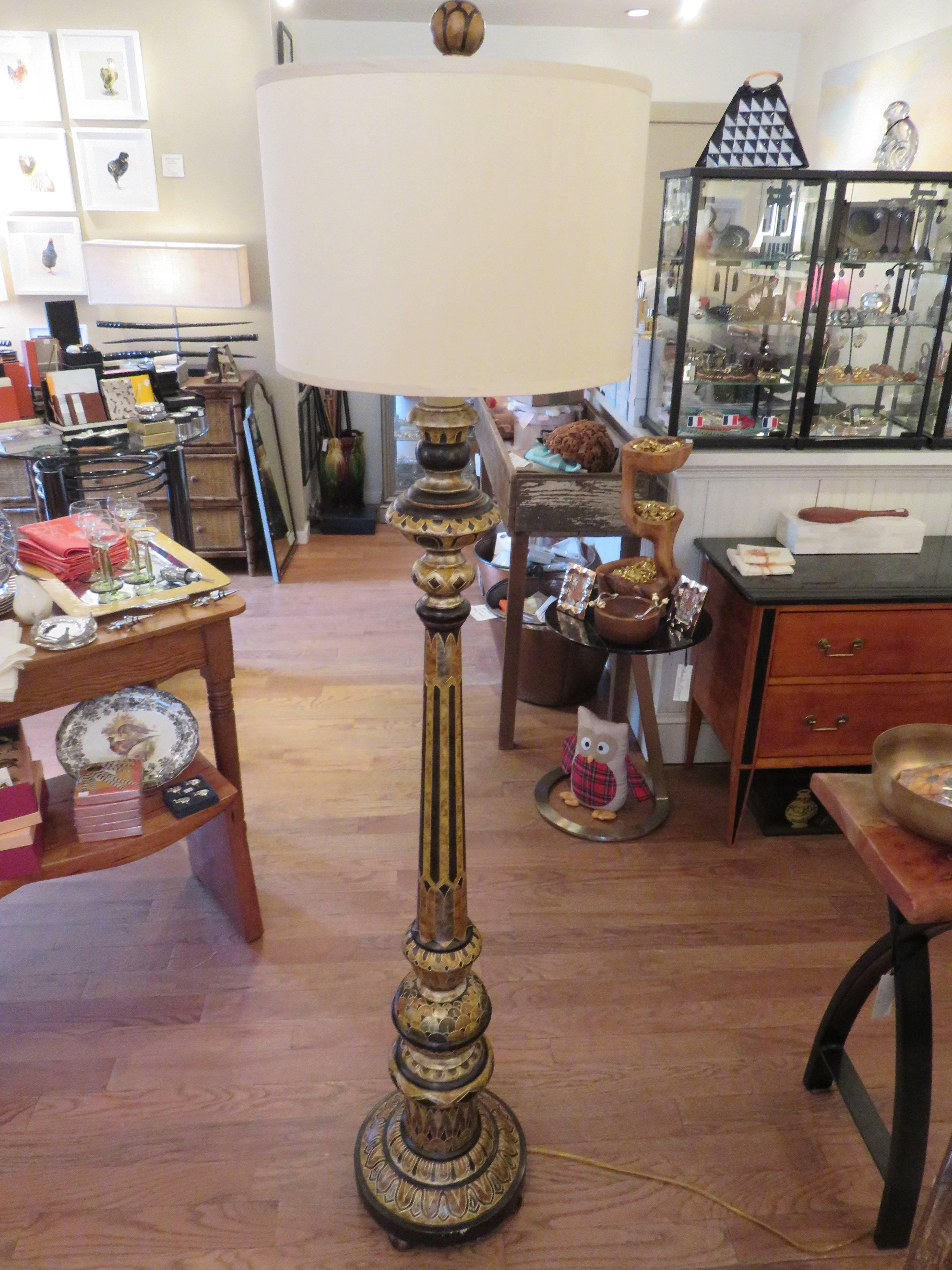 Hand-crafted ebony wood, and hand decorated classical English floor lamp. Golds, coppers, bronze and ebony tones, make this lamp a work of art.
New three way switch up to 150 watts,beige silk shade,stunning for any setting.
Measuring 60 inches to