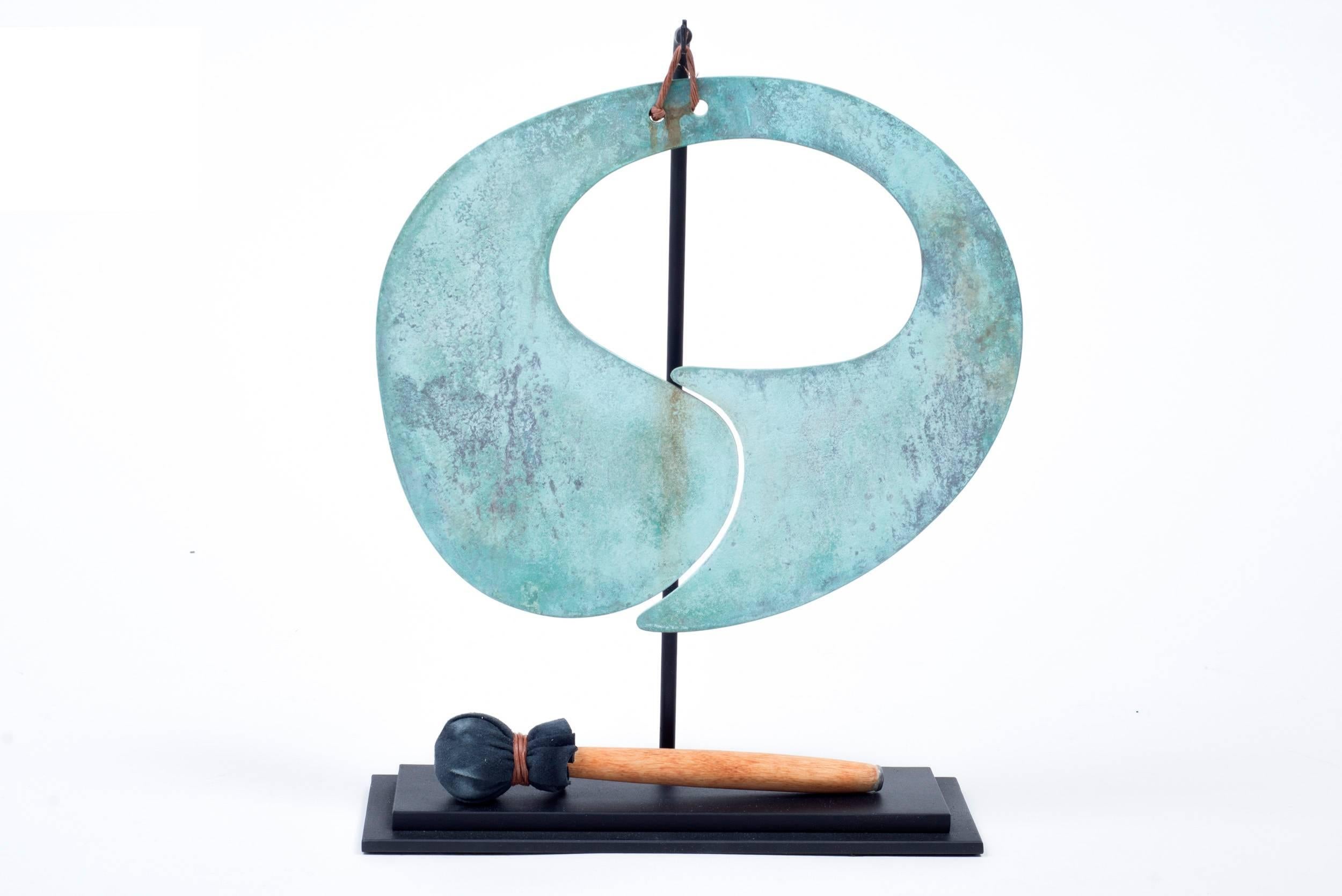 This gong has an amazingly distinctive form and an incredible patina. It is a smaller scale than the Classic solid bronze gongs he created. It comes with a Stand and mallet of appropriate scale.