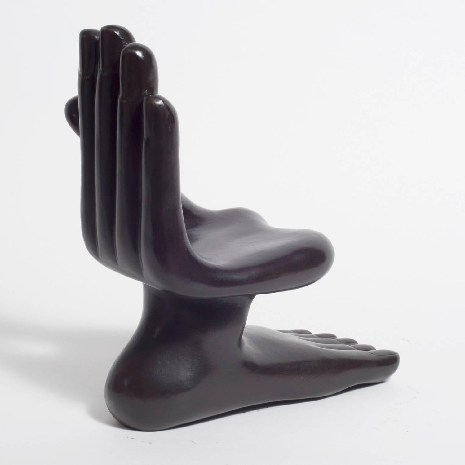 From his first exhibition, his work has had an easily identifiable style, although it is not easily classifiable. His best known piece is the “Hand-Chair” a sculpture or chair designed for people to sit on the palm, using the fingers as back and arm