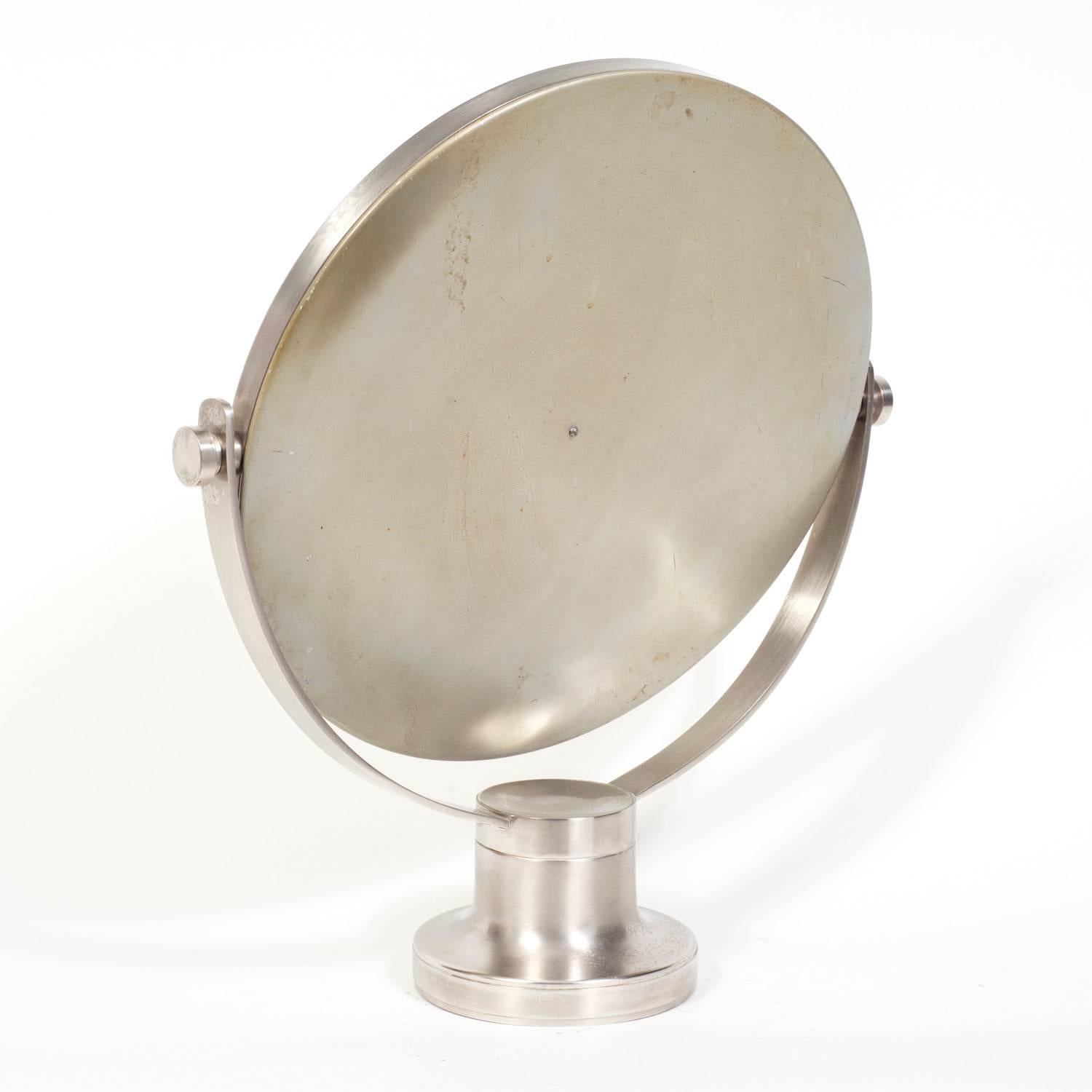 Mazza, known for his mirrors, designed a variety of these finely made vanity mirrors.