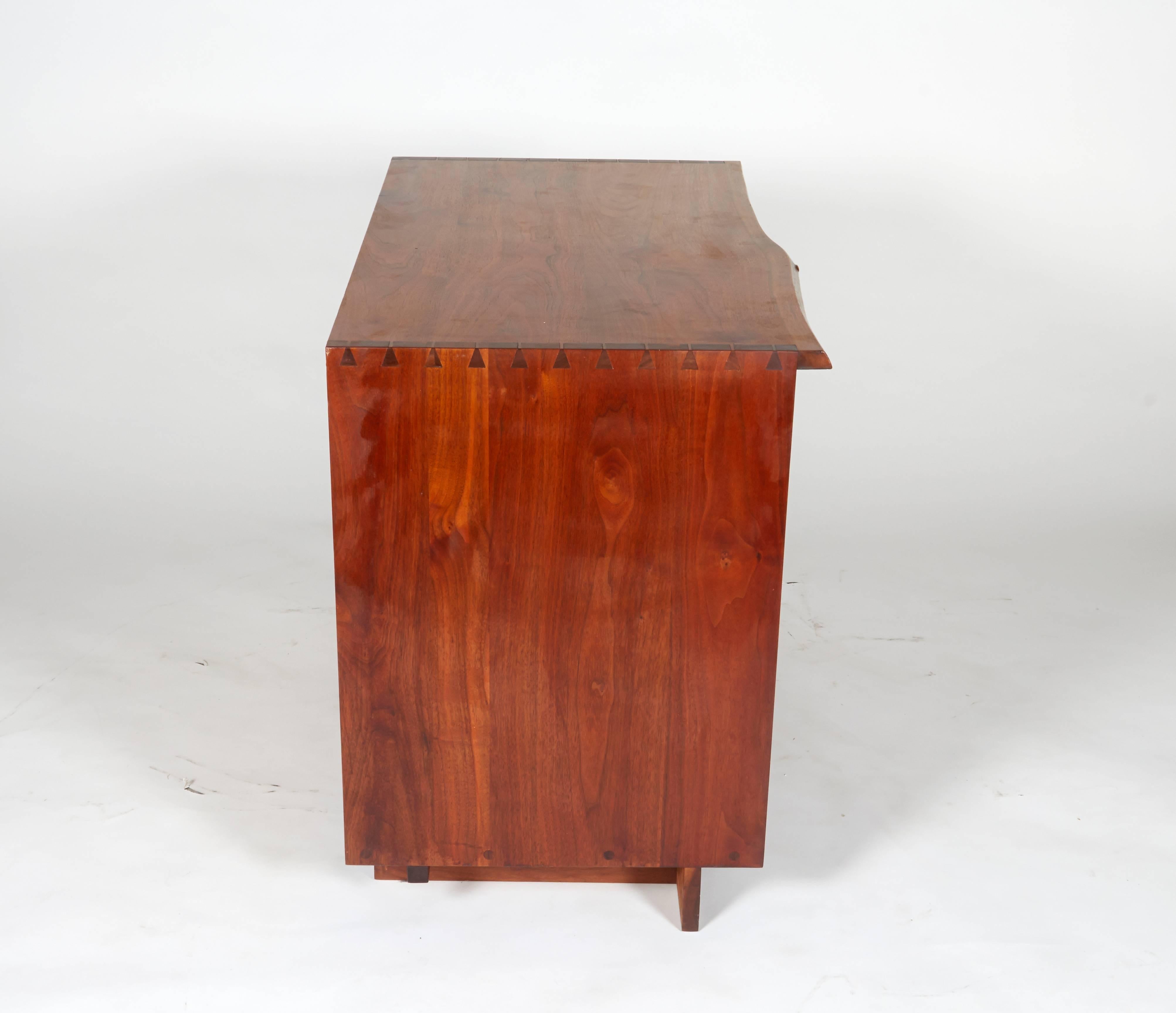 Rare in the free edge form this chest has Nakashima's signature dovetail joinery and is in unusually good original condition.