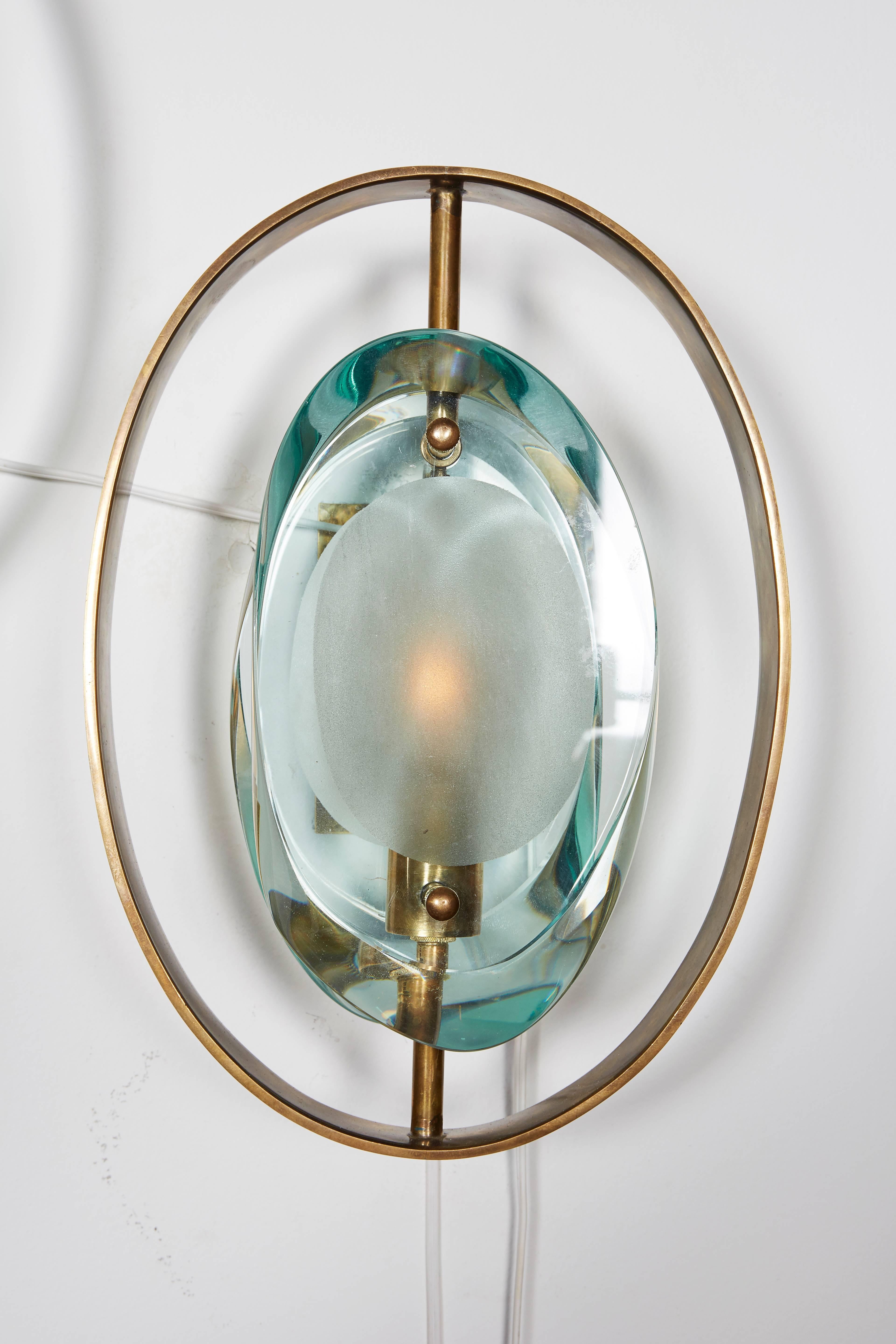 These sconces are handmade by contemporary Italian craftsman in the style of classic Mid-Century designs. The quality is consistent with the master Italian glass makers of the period.