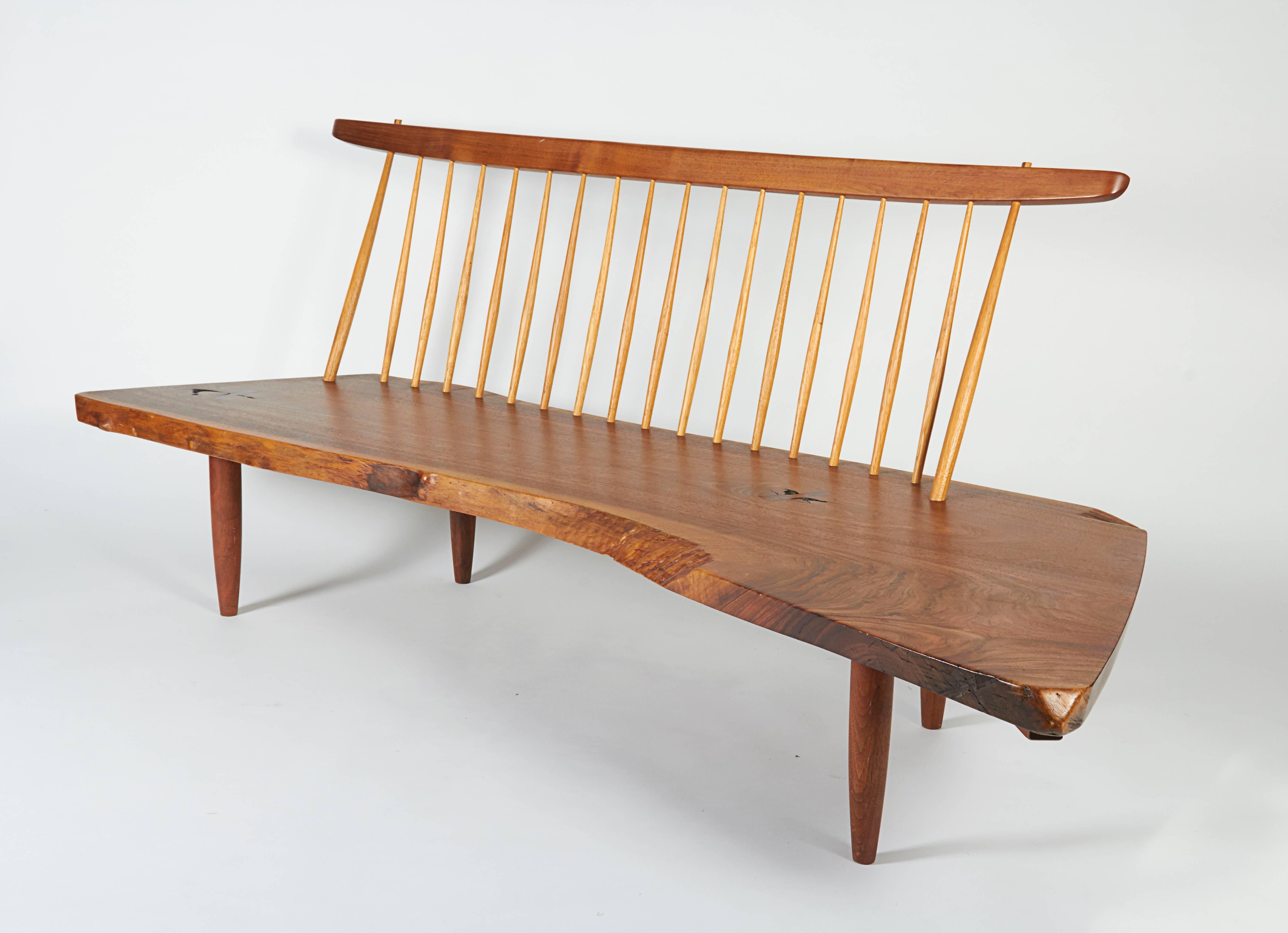 A superior example of this classic Nakashima form with two rosewood butterflies and unusually irregular and beautiful grain characteristics.