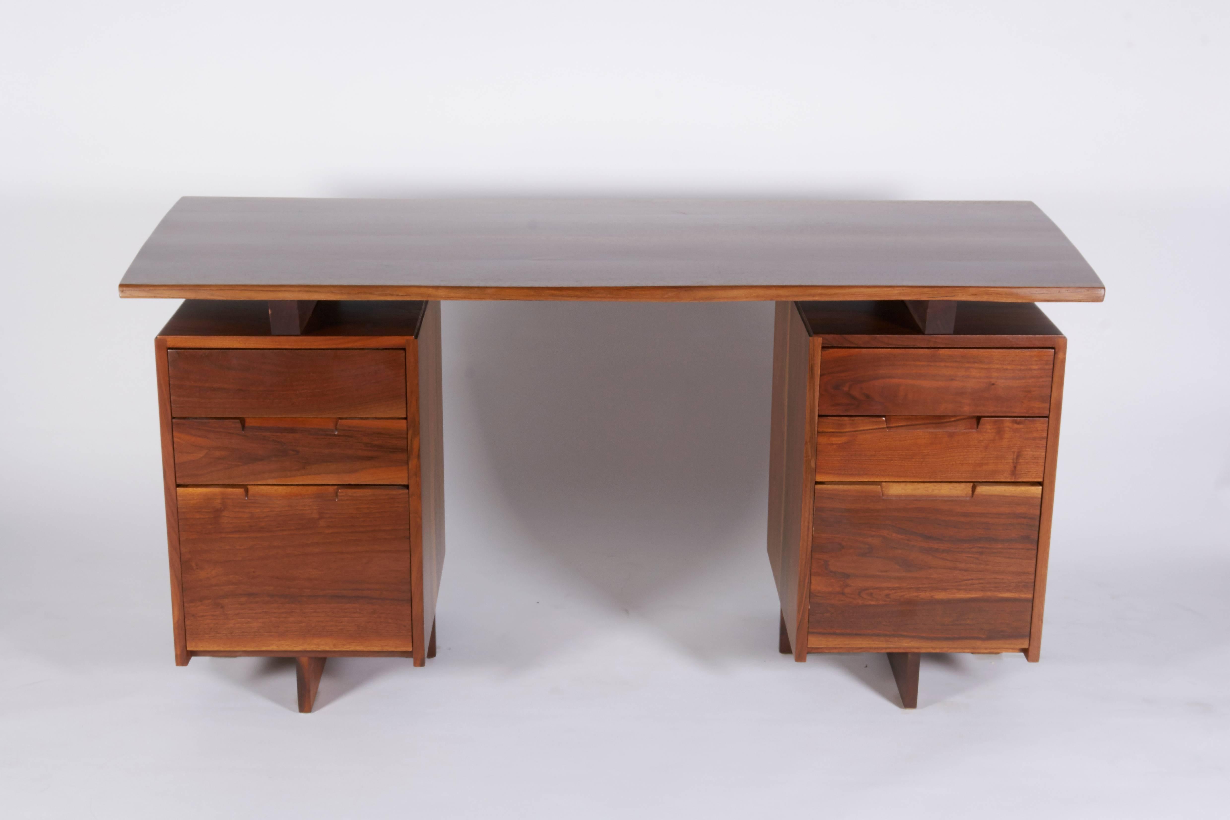 A Classic Nakashima desk both beautiful and functional with ample storage.