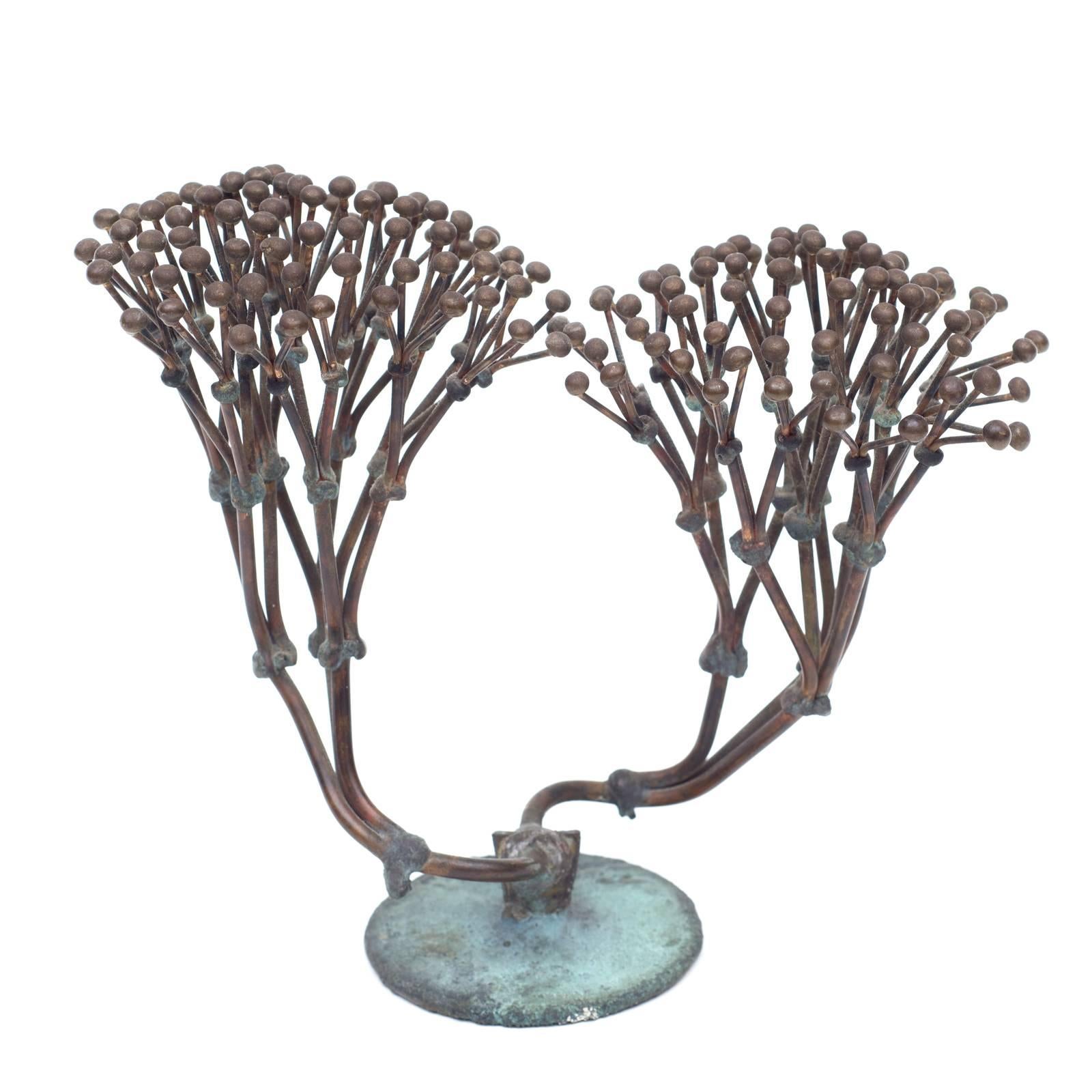 An elegant small-scale Harry Bertoia bush form. The open form exposes the details and intricate qualities that all his bush form sculptures possess but are not easily seen in the denser examples.