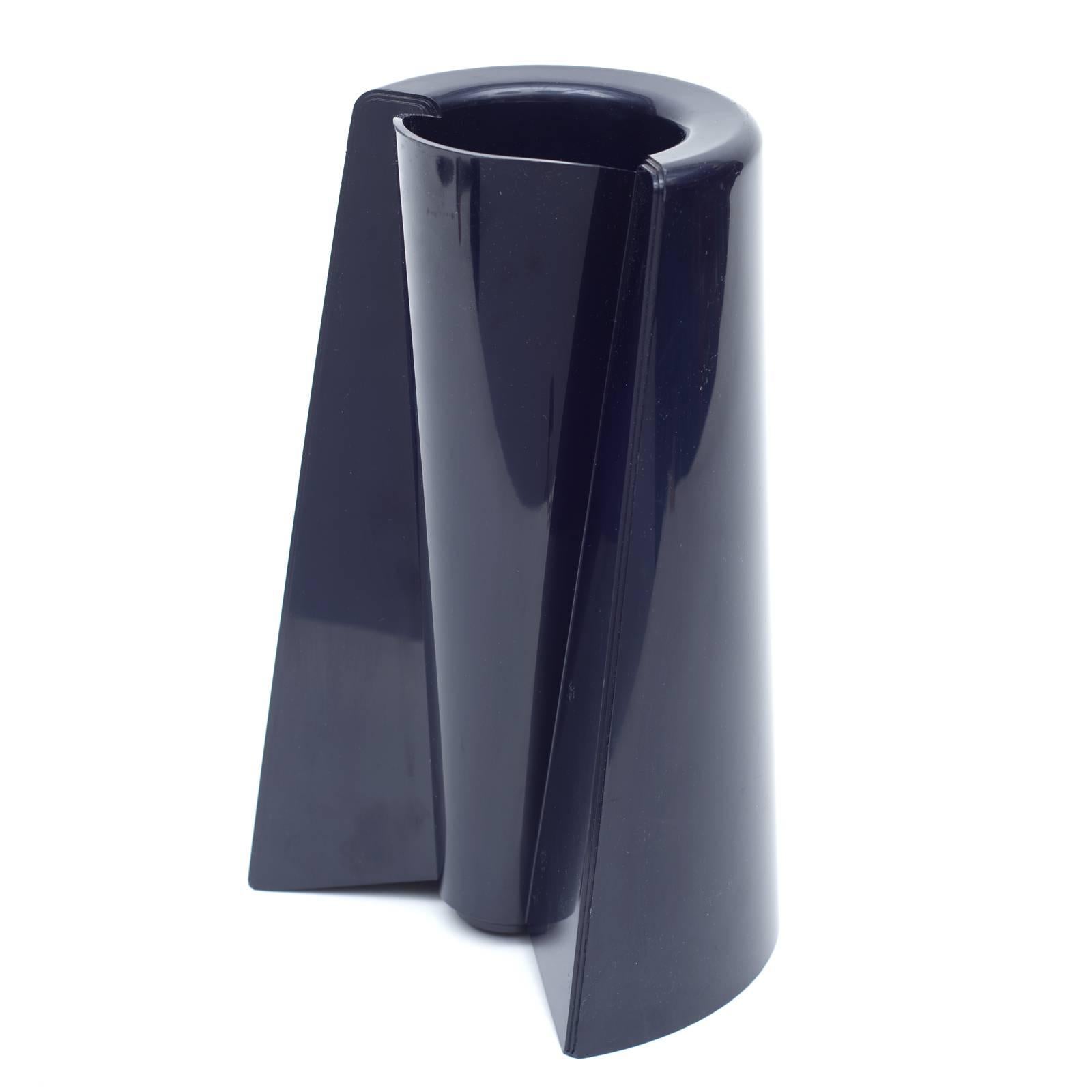 Designed by Enzo Mari in the 1960s this Pago Pago vase is black plastic and can be used standing on either end. Marked on the inside bottom of the vase.