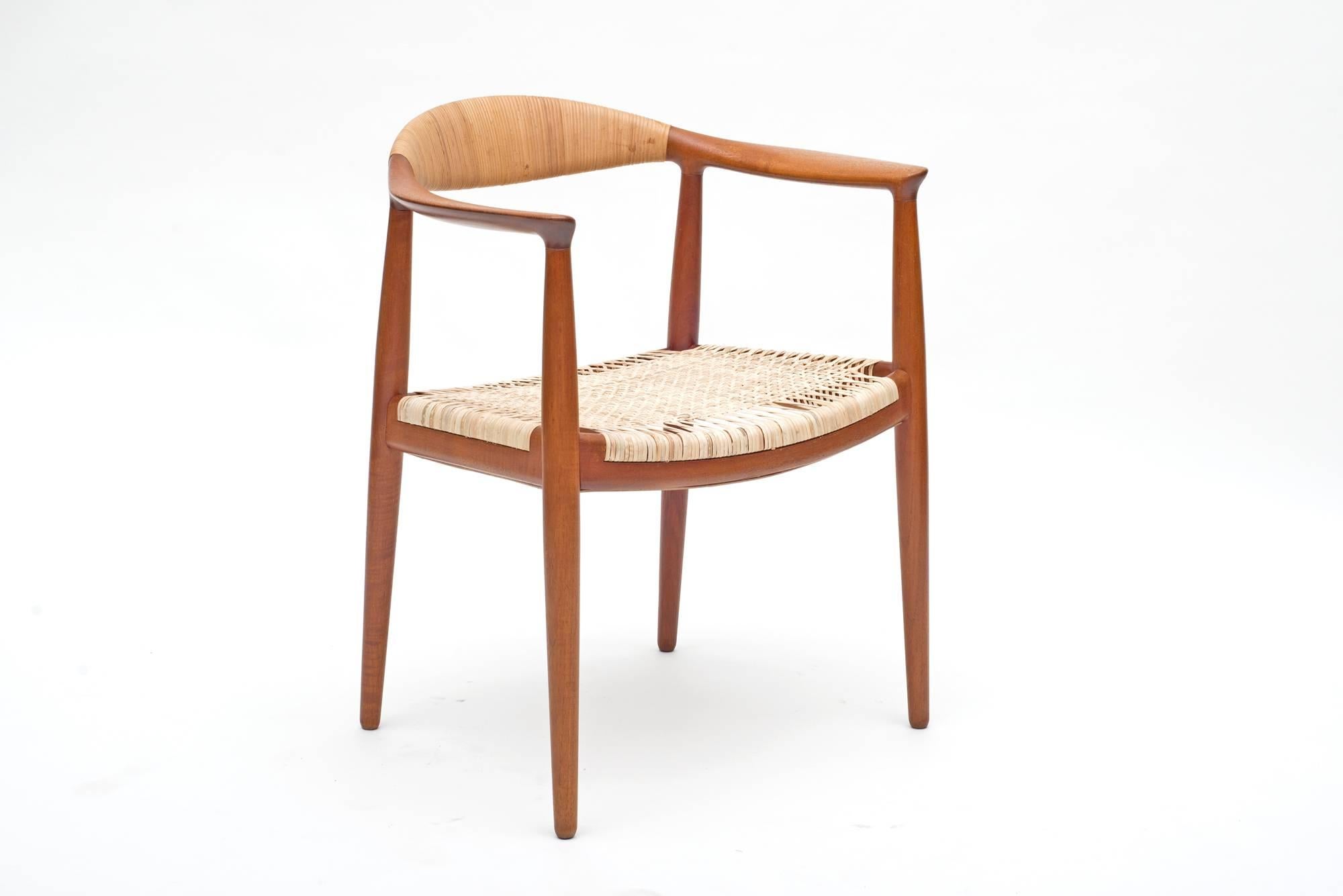 Arguably the most iconic chair of Scandinavian Mid-Century furniture. Newly re-caned and in excellent condition.