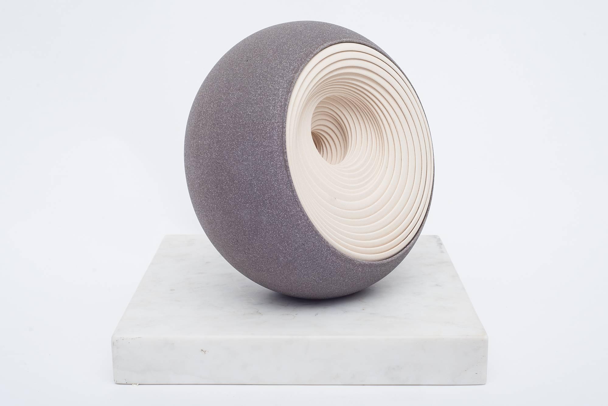 Chambers works in his studio on the Isle of Wight where he creates each piece without the aid of sketches or designs, preferring to experiment as he works. Each “layer” is an individual section thrown on a potter’s wheel which he then assembles with