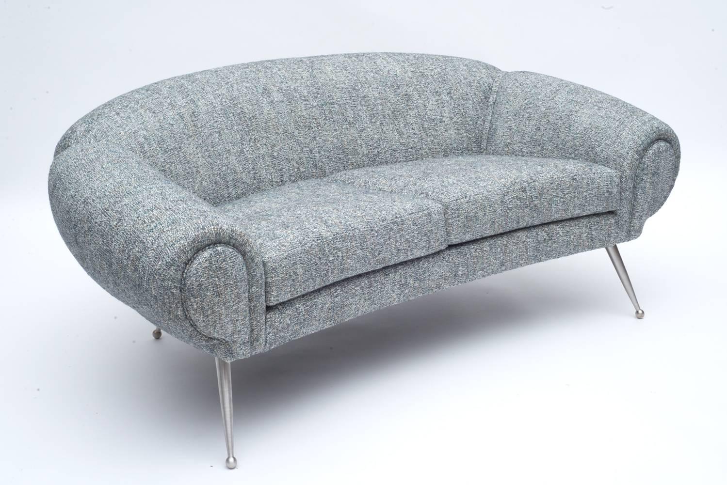 The form is consistent with his other plush and luxurious furniture of the period. There is also a lounge chair available in the same form. Upholstered in customers own material (C.O.M.).