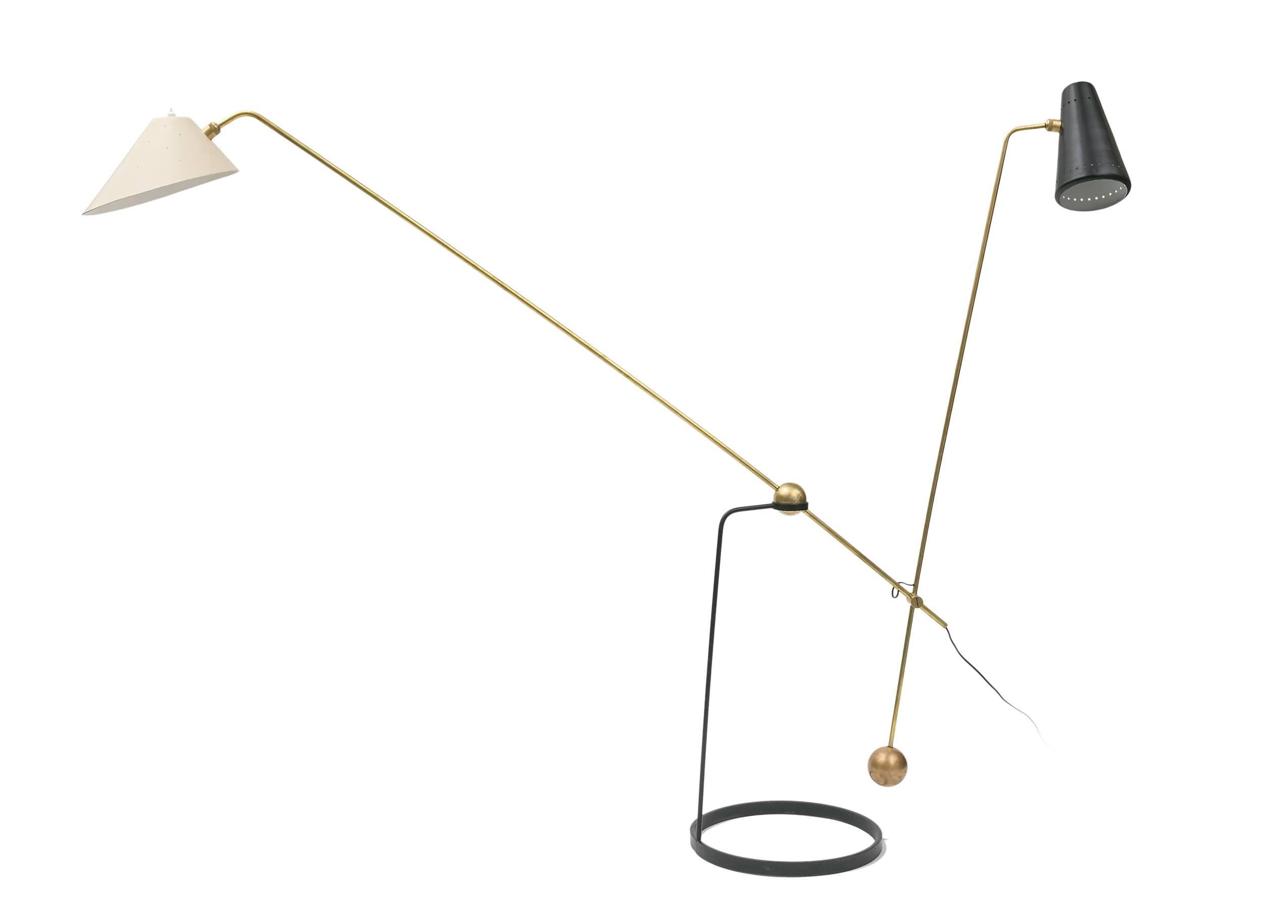 A rare double branch floor lamp designed by Pierre Guariche and manufactured by Pierre Disderrot.