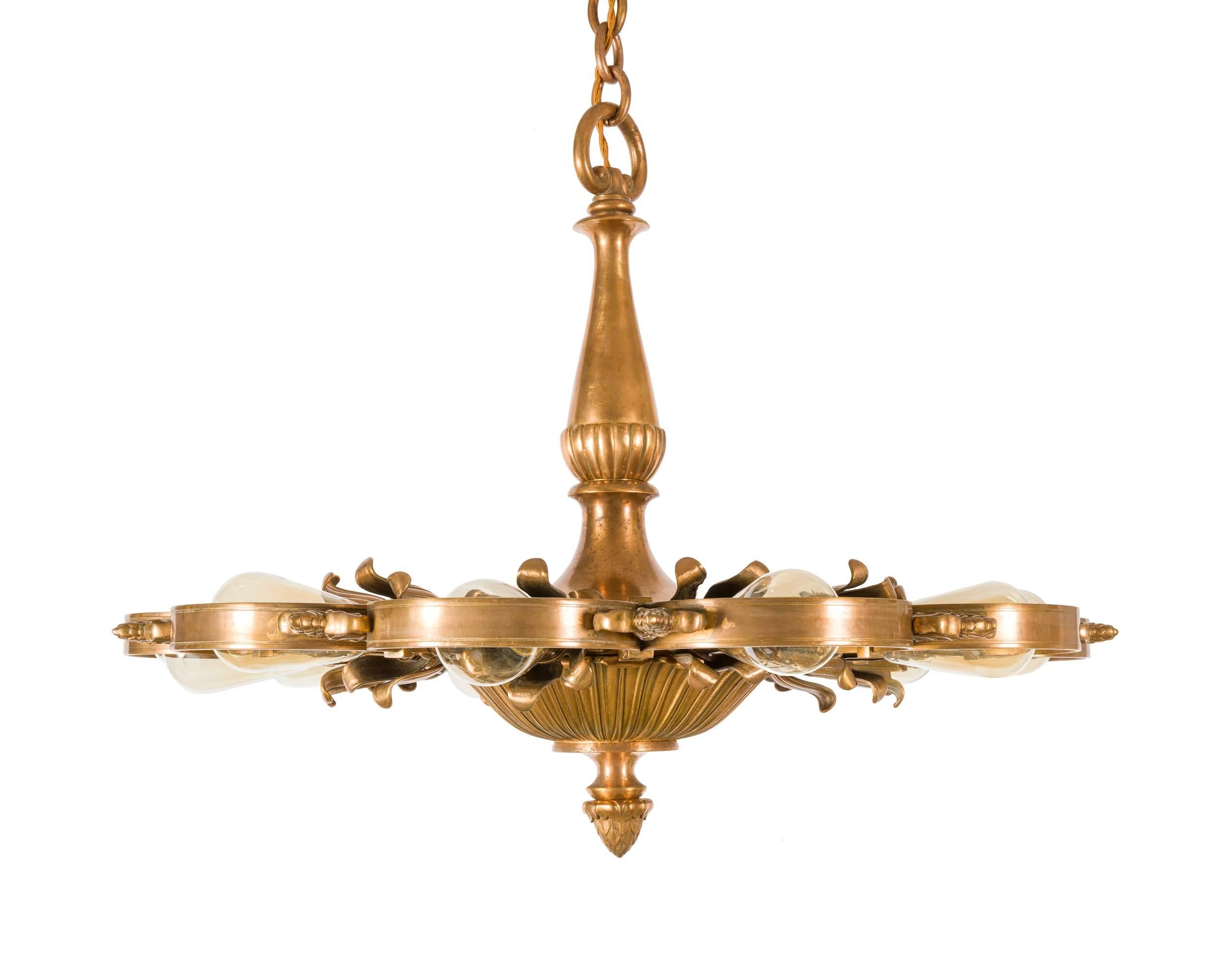 Outstanding chandeliers by the premier lighting manufacturer of the early 20th Century. There are four available. The measurement indicated for the height can be increased significantly if necessary with the original chain that is available.