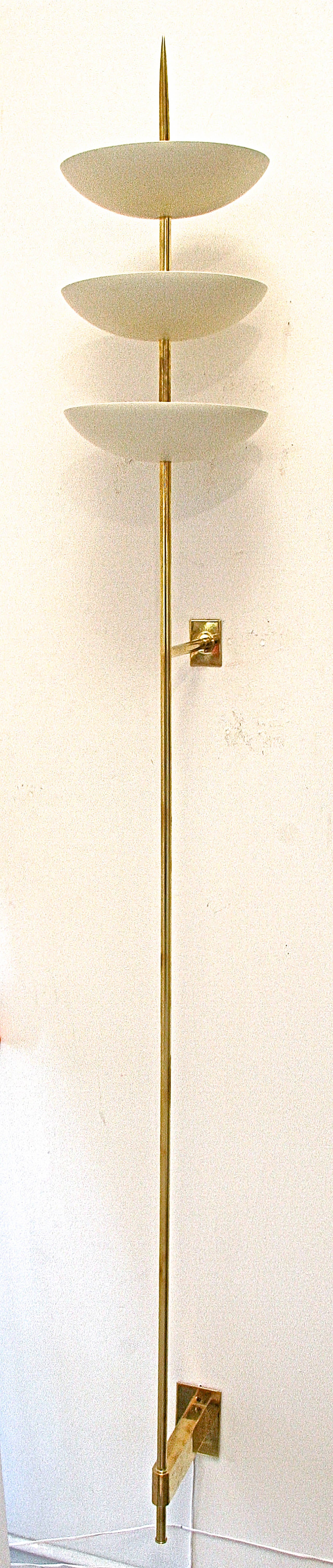 Unique in scale these sconces have an amazing presence. They make an incredibly strong statement.