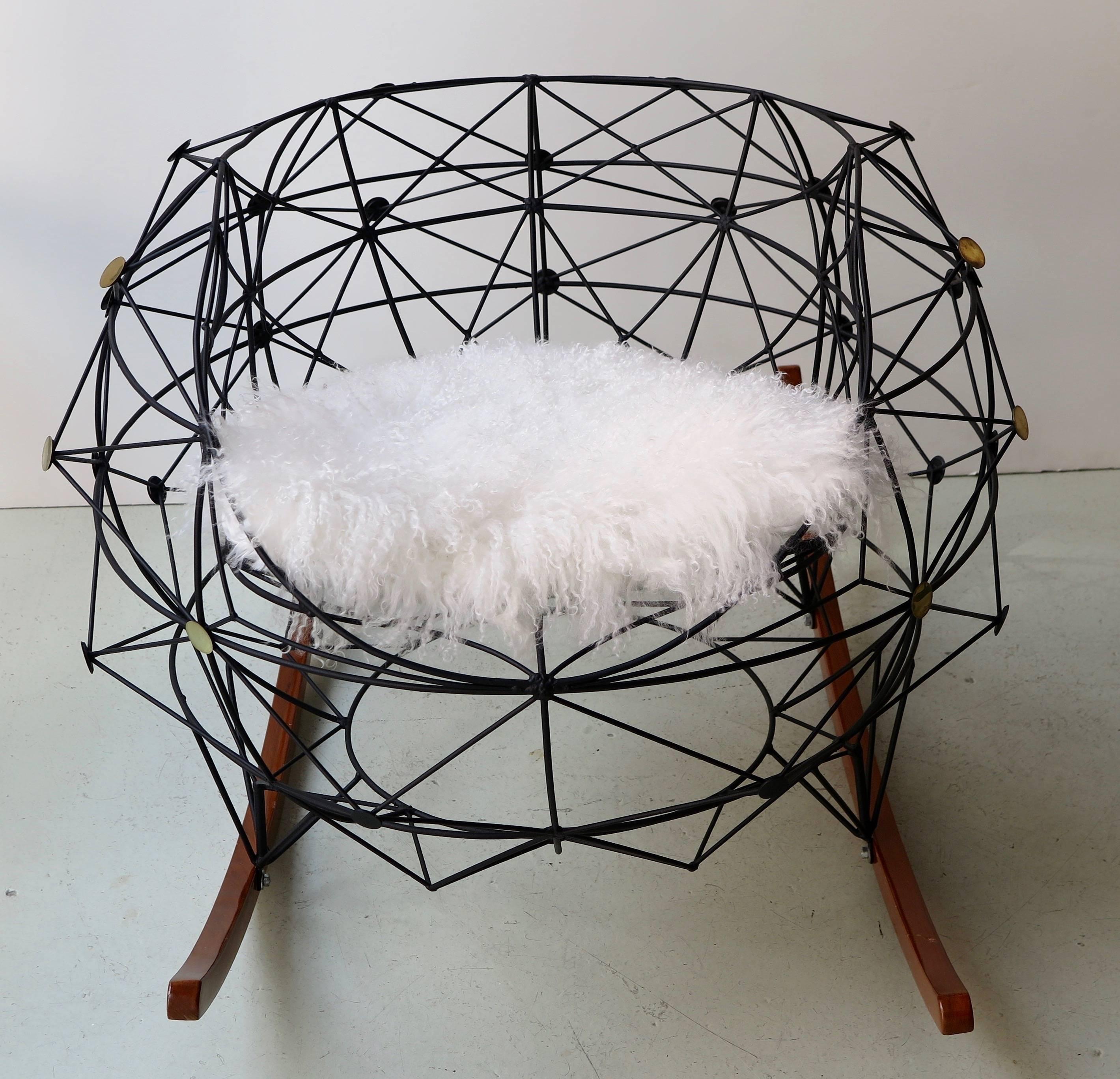 Functional art chair in powder coated wrought iron with brass insets and wooden legs by Baltasar Portillo, El Salvador, 2016. Inspired by the pattern of connecting stars in the sky within boundaries of what is known as the 