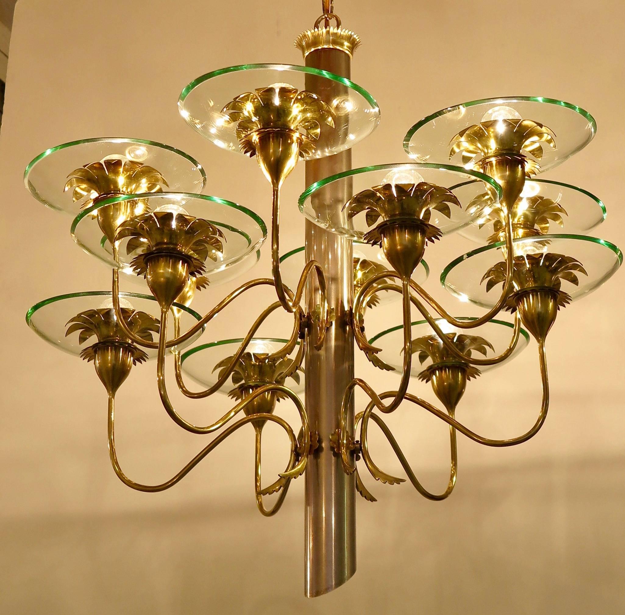 Twelve-arm chandelier in brass, chrome and glass by Pietro Chiesa for Fontana Arte designed for a villa in Milano by Osvaldo Borsani, circa 1947.
The chandelier is published in the Osvaldo Borsani book.