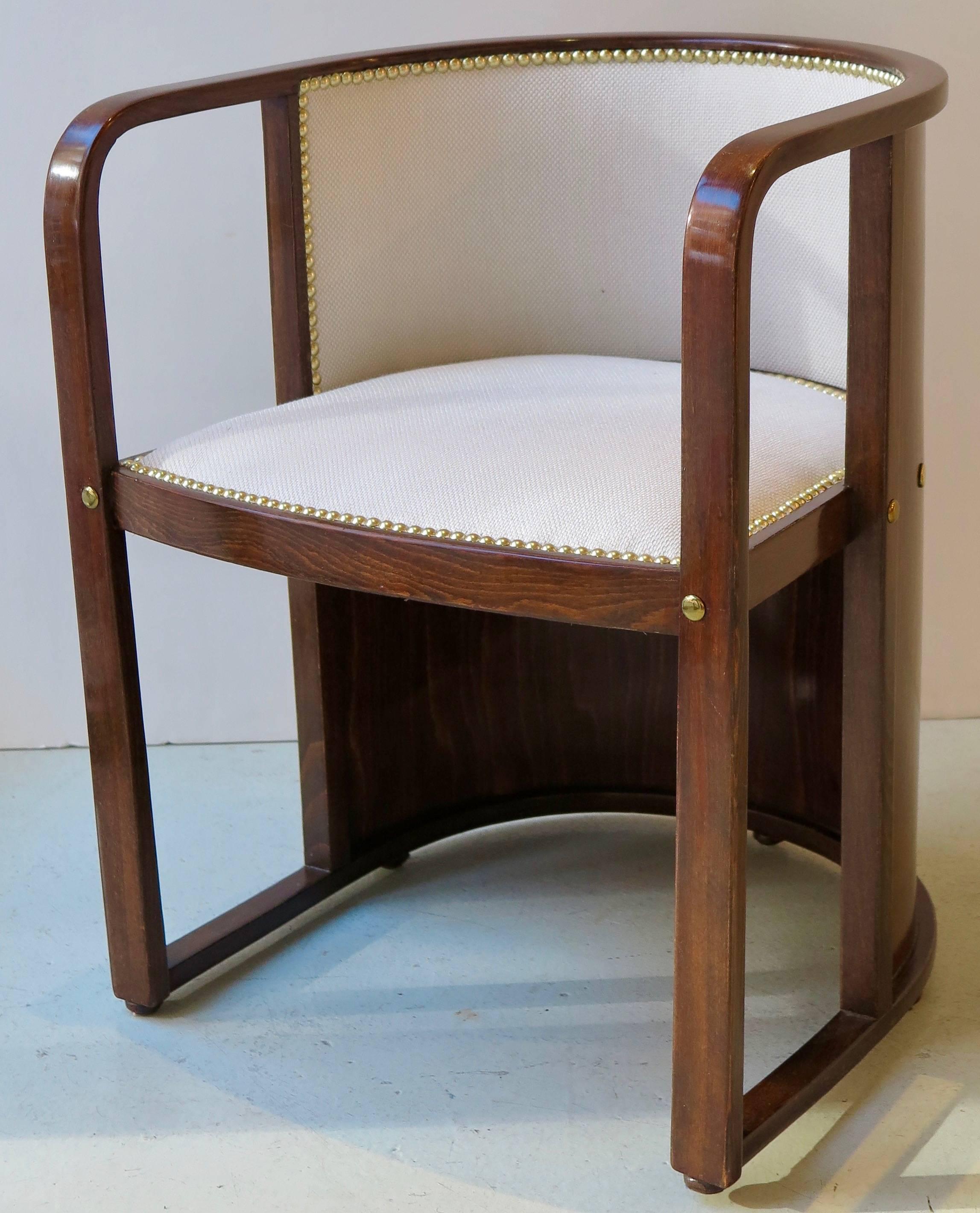 Pair of Vienna secession armchairs, model 421, in mahogany stained beechwood with brass nails on back of the chairs by Josef Hoffmann, produced by J. & J. Kohn, Austria, circa 1907.