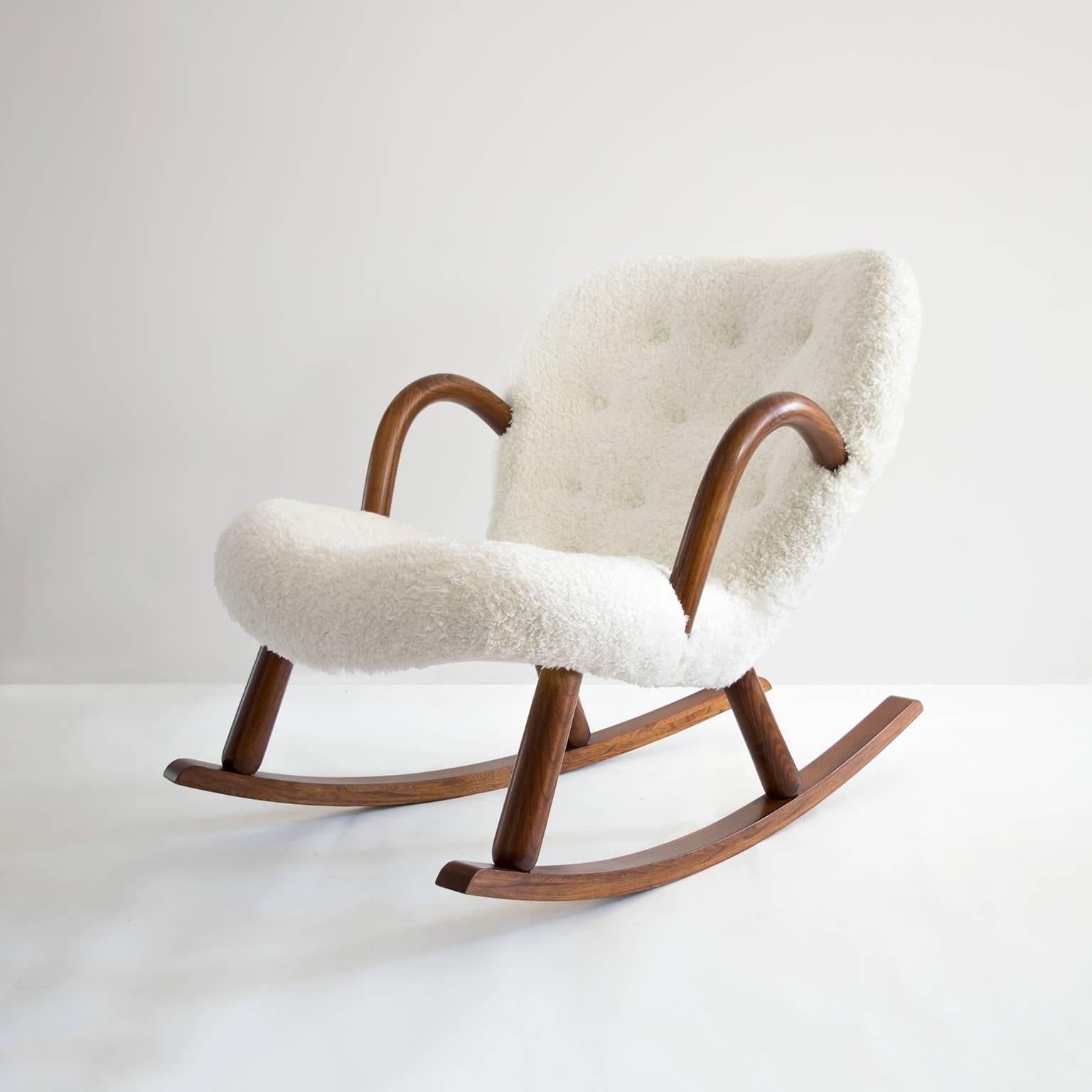 Scandinavian modern armchair designed by Phillip Arctander and first introduced circa 1944 and produced by Nordisk Staal & Mobel Central, Denmark. Chair is constructed of stained beechwood. Newly restored and reupholstered in 