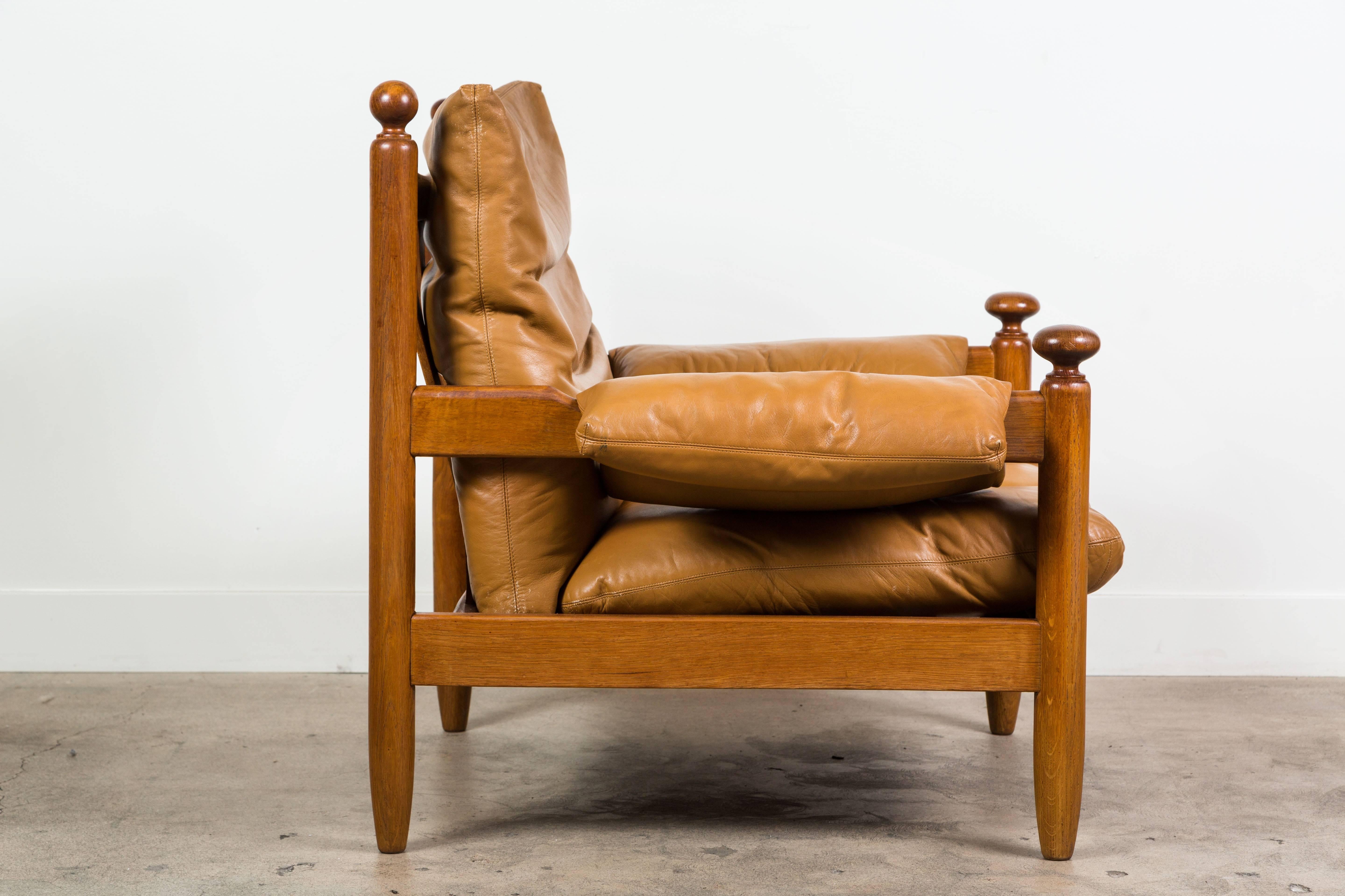 Oak and leather armchair in the style of Maurice Pre.