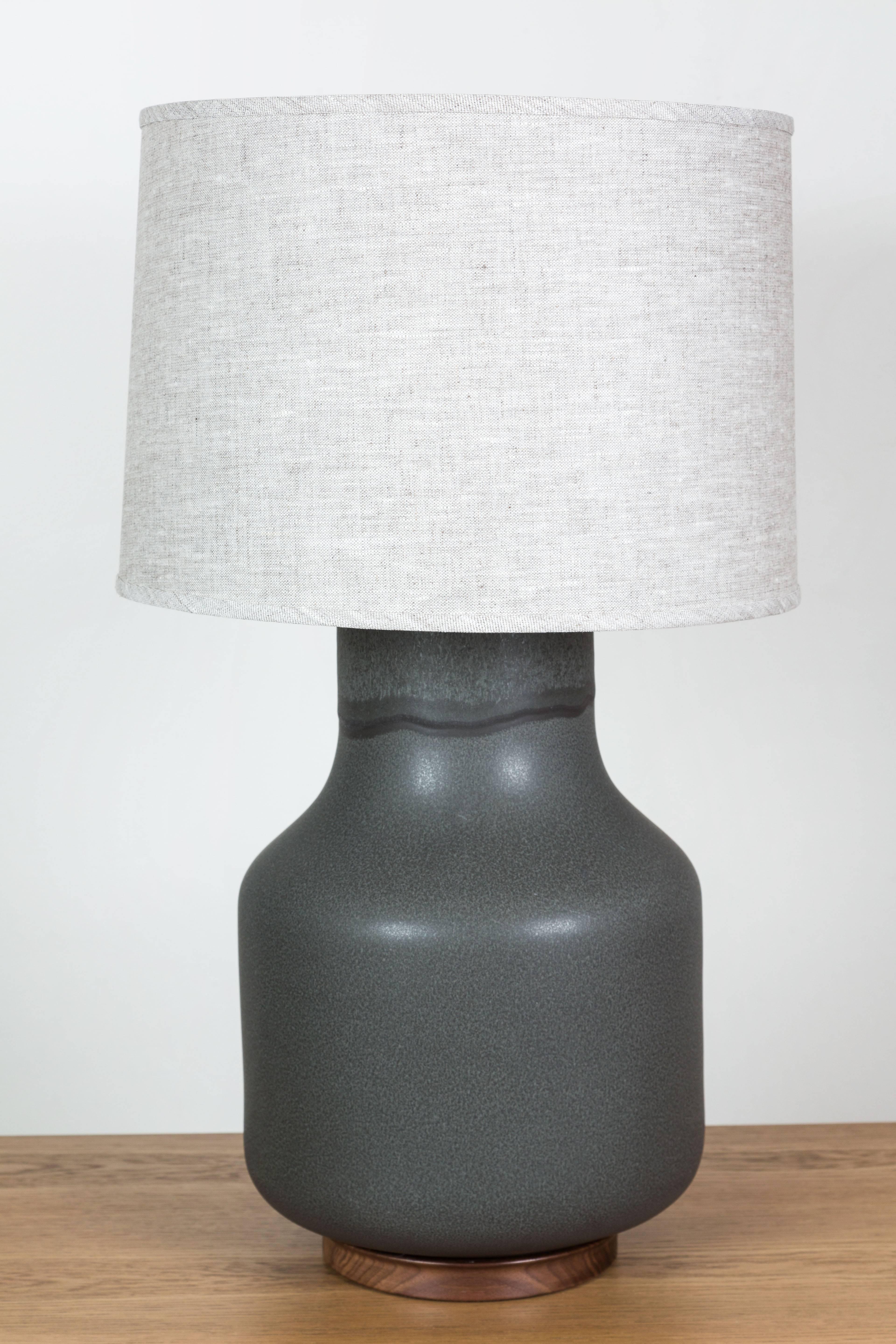 Pair of Simone lamps from NY based  Stone and Sawyer. Beautifully made ceramic lamps. Brass fittings. Linen shade.