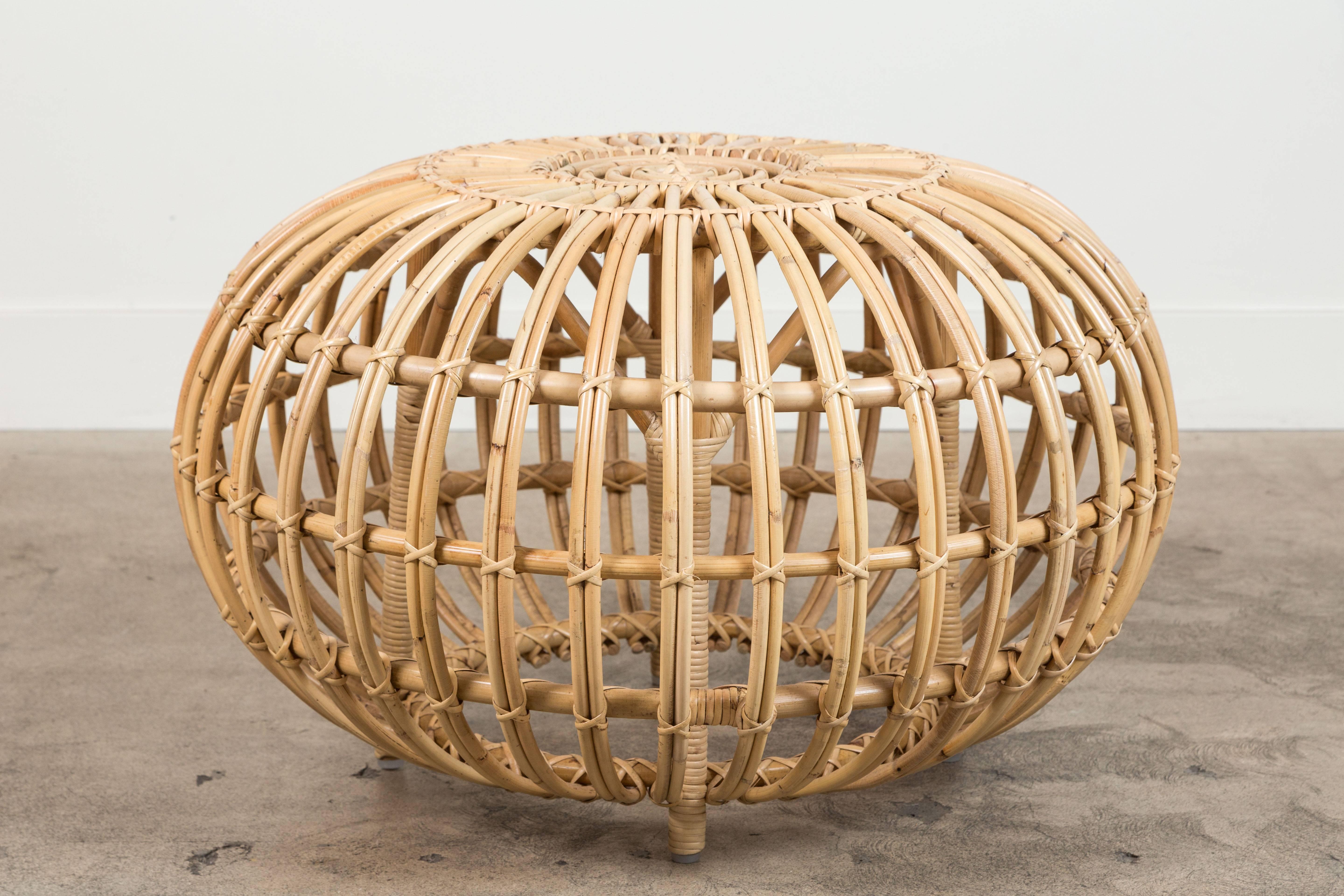 Small rattan ottoman by Franco Albini. Current production by Sika Design.