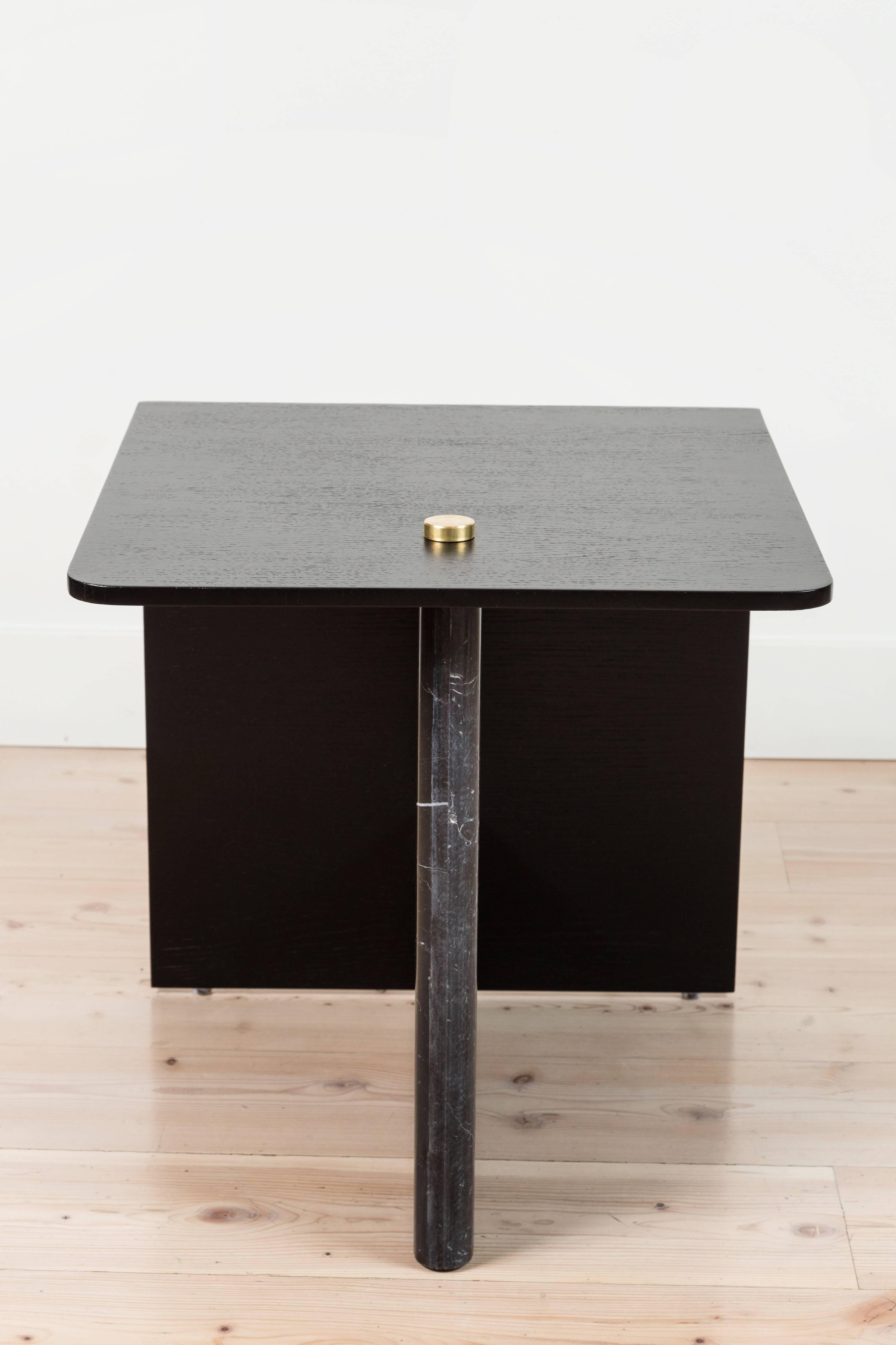 The Huxley Side Table features a waterfall oak or walnut top, a stepped stone base and brass details. Shown here in Ebonized Oak and Negra Marquina Marble. 

The Lawson-Fenning Collection is designed and handmade in Los Angeles, California.

Can be