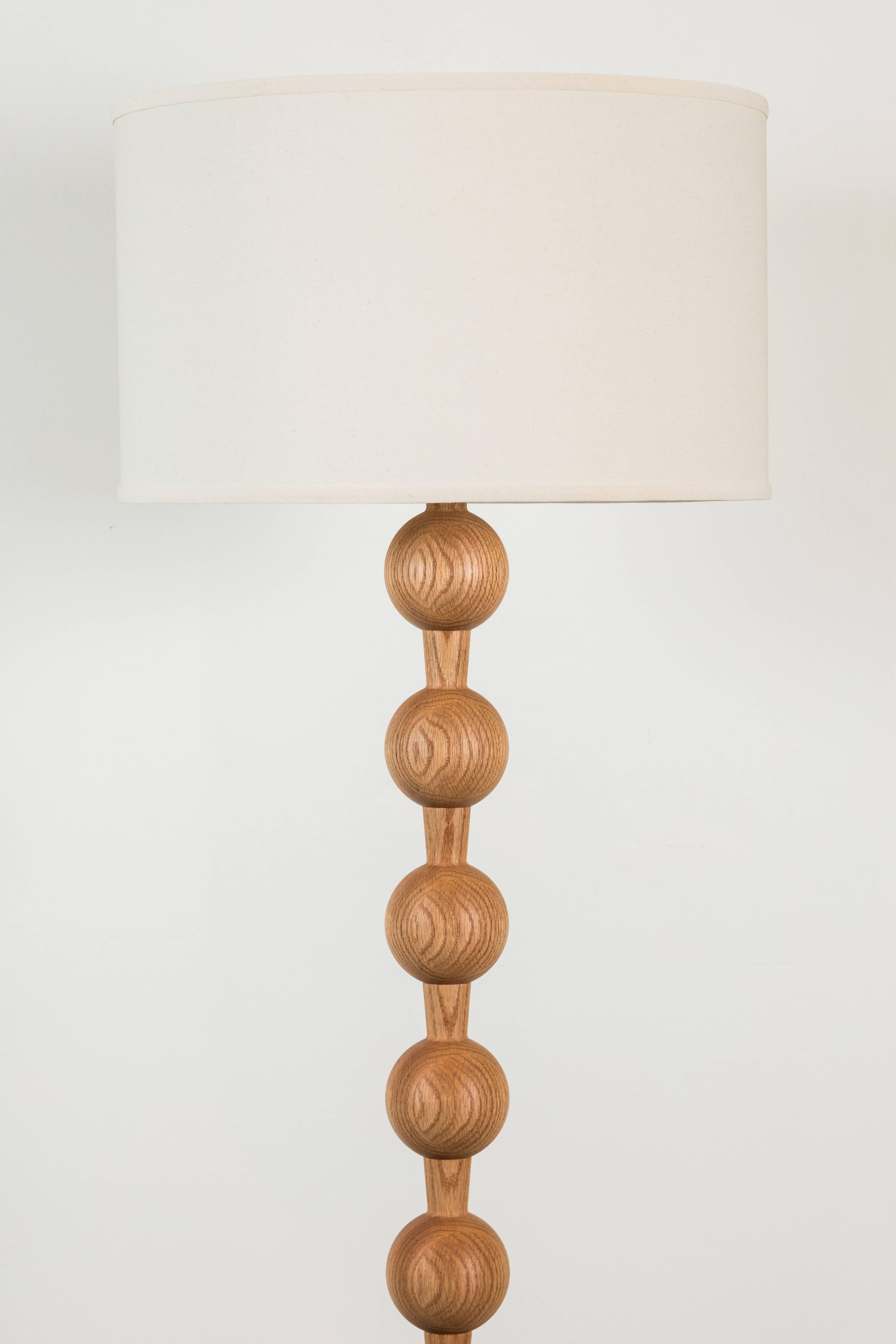 Hugo barbell floor lamp by Lostine.