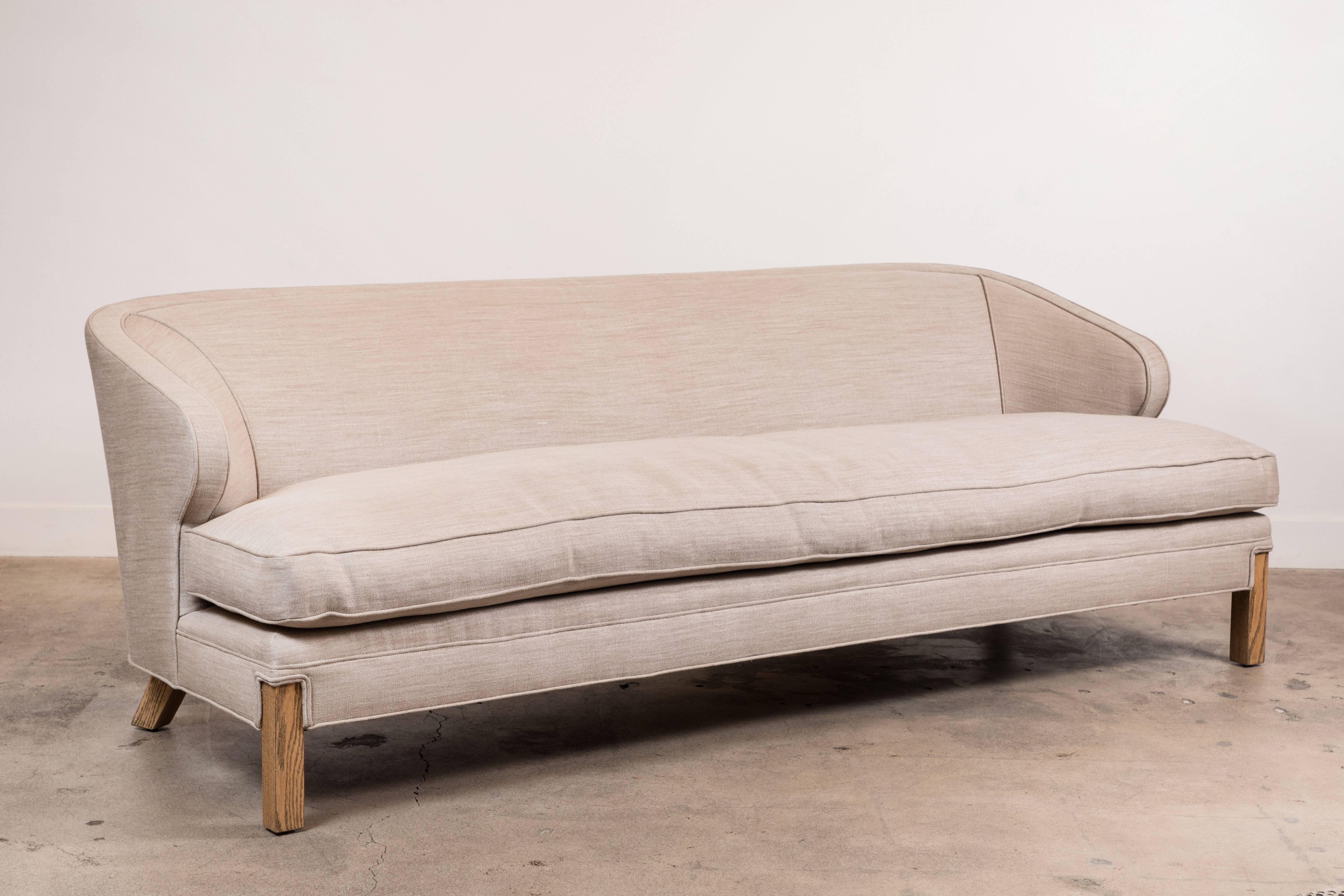 The Douglas Sofa is a low slung sofa with a down-wrapped seat cushion and solid American walnut or white oak legs.

Available to order in Customer's Own Material with a 6-8 week lead time. 

As shown: $5,040
To order: $3,450 + COM.