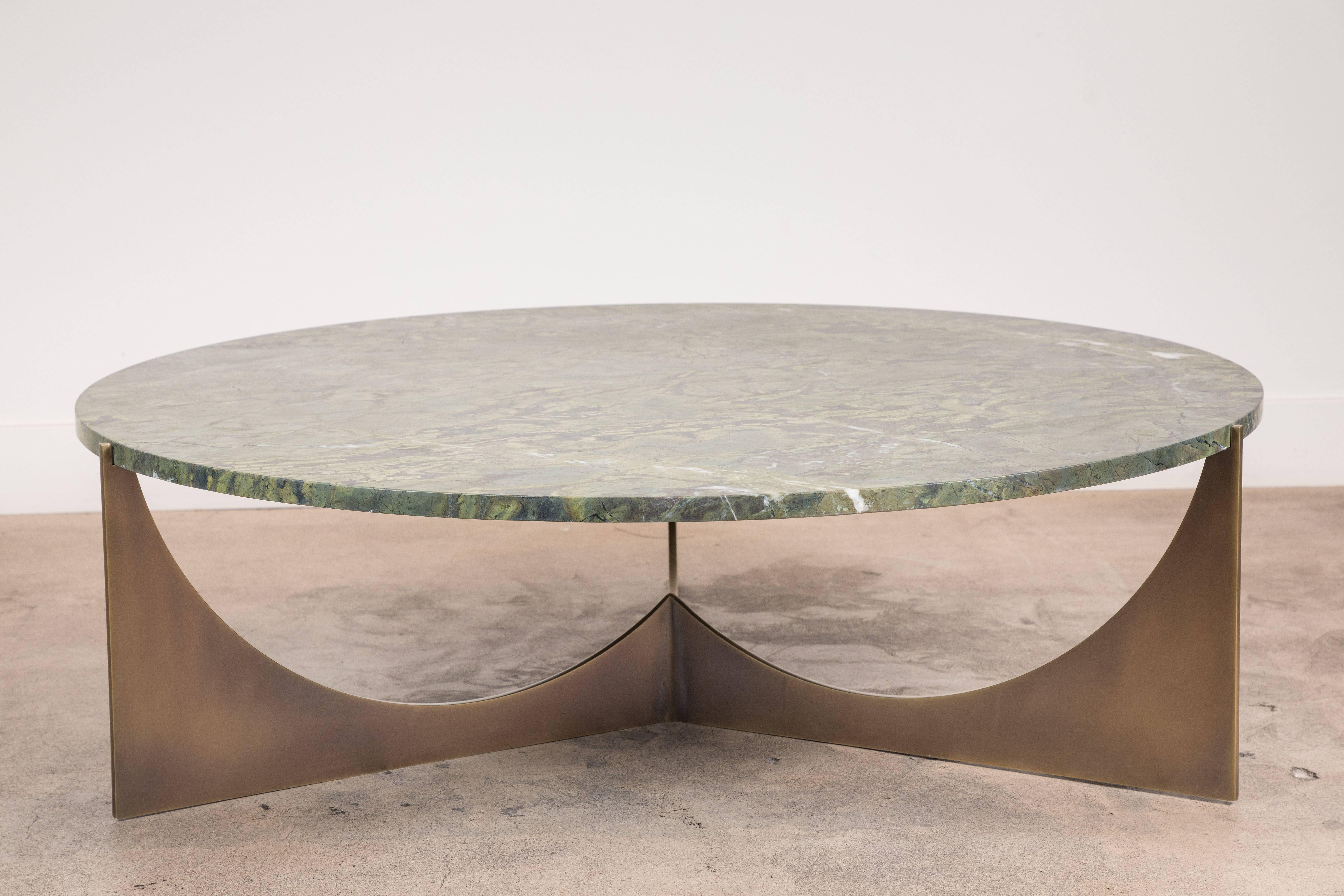 Eclipse coffee table by Ten10 in solid brass and green granite.