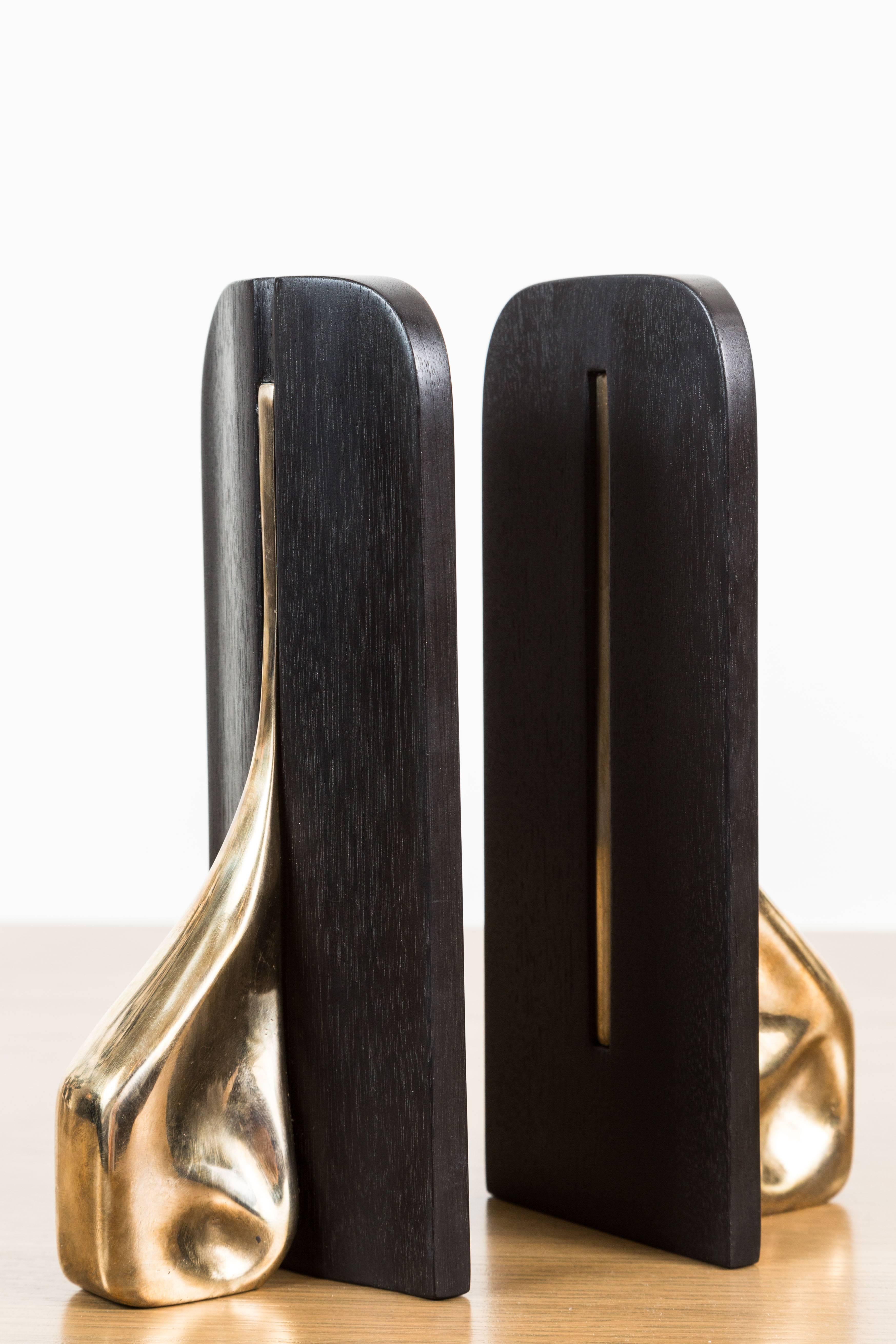 Contemporary Pair of Ebonized Walnut and Cast Bronze Bookends by Vincent Pocsik