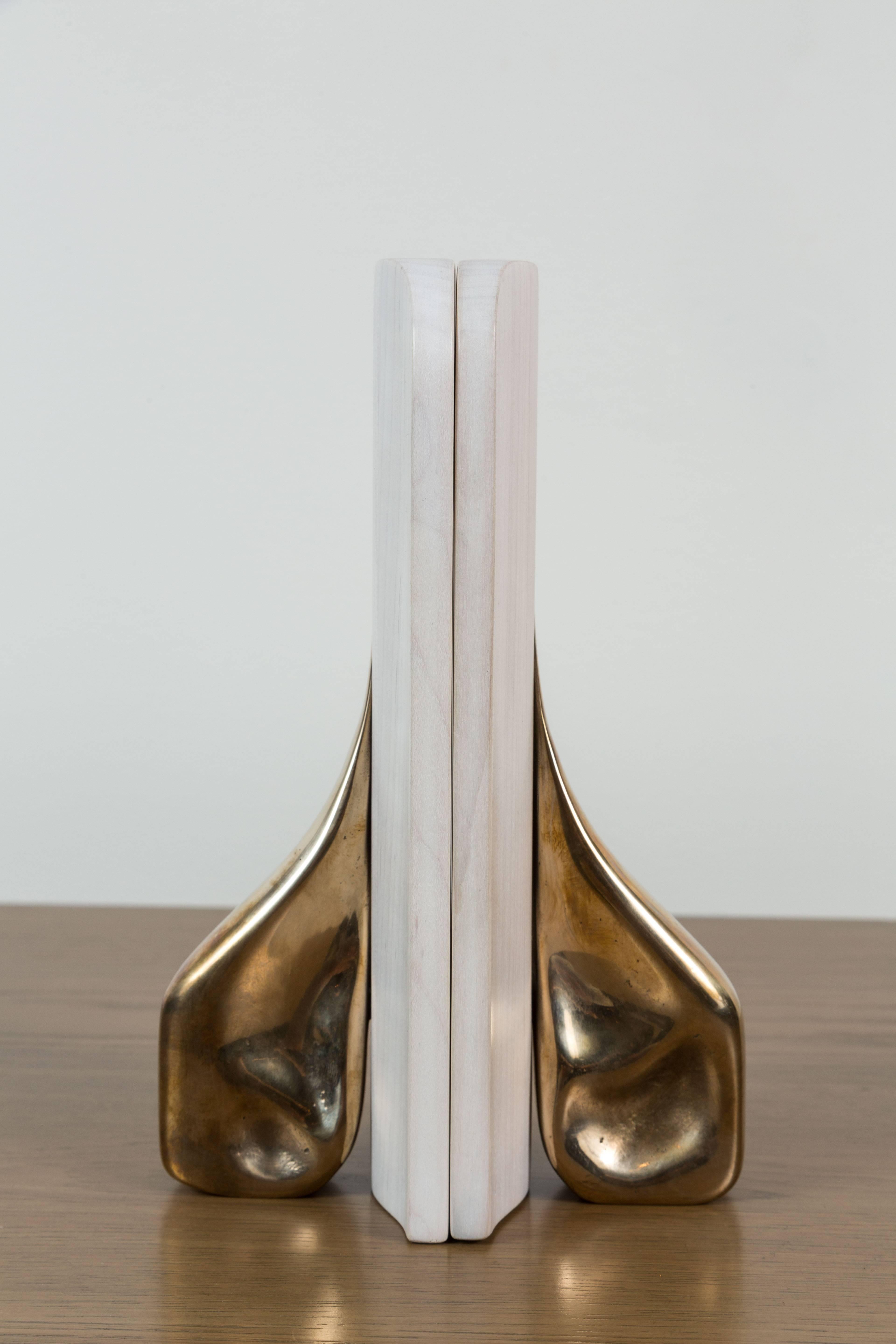 Pair of Bleached Maple and Cast Bronze Bookends by artist Vincent Pocsik in collaboration with Lawson-Fenning. Made of natural materials, this decorative object can be accessorized on table top, book shelf, or desk to achieve an organic modern