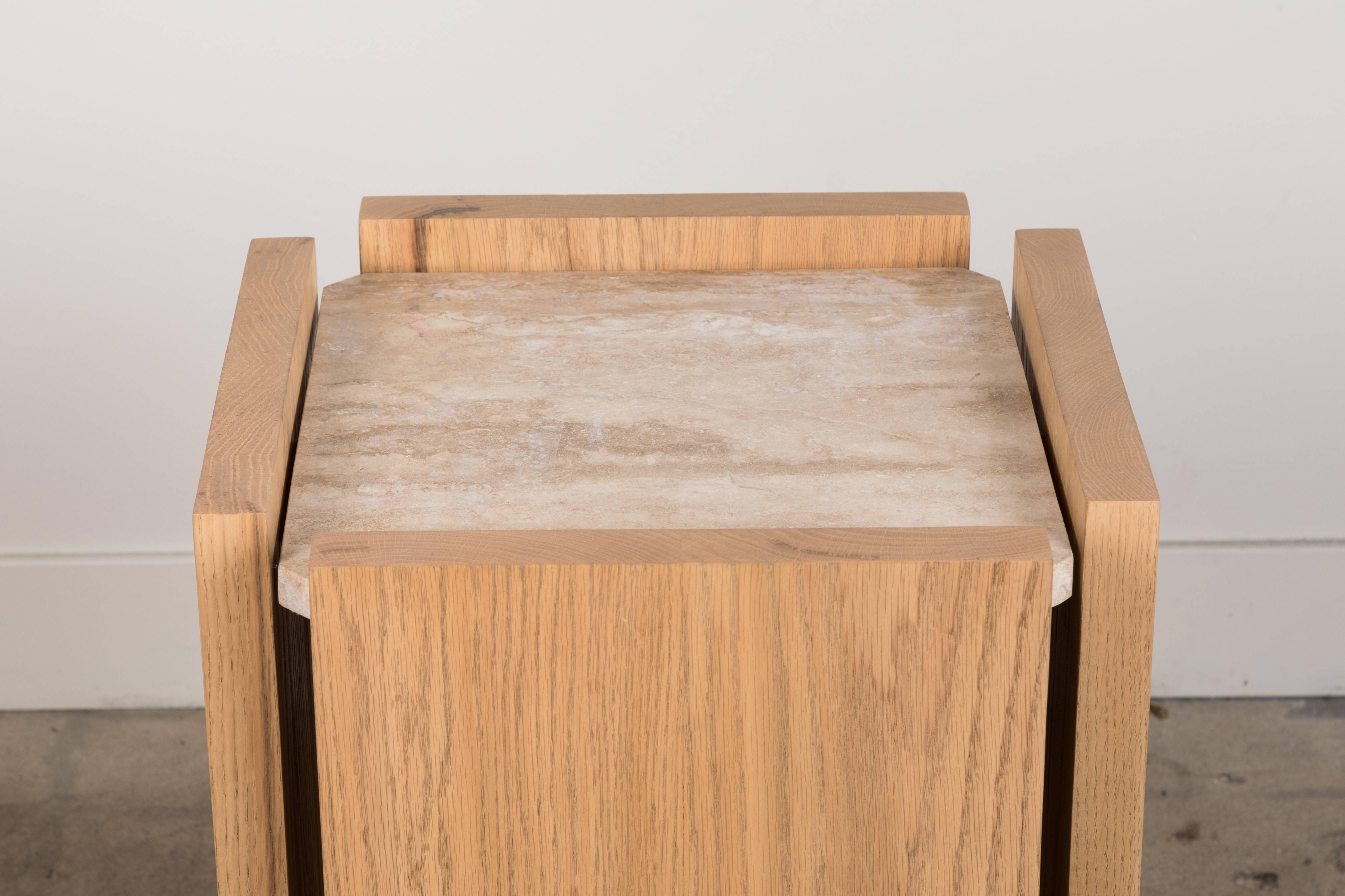 The Eppes Side Table is part of the collaborative collection with interior designer Brian Paquette and features a solid oak base with an octagonal stone top. This piece is available in exclusive BP for LF finishes as well as the standard